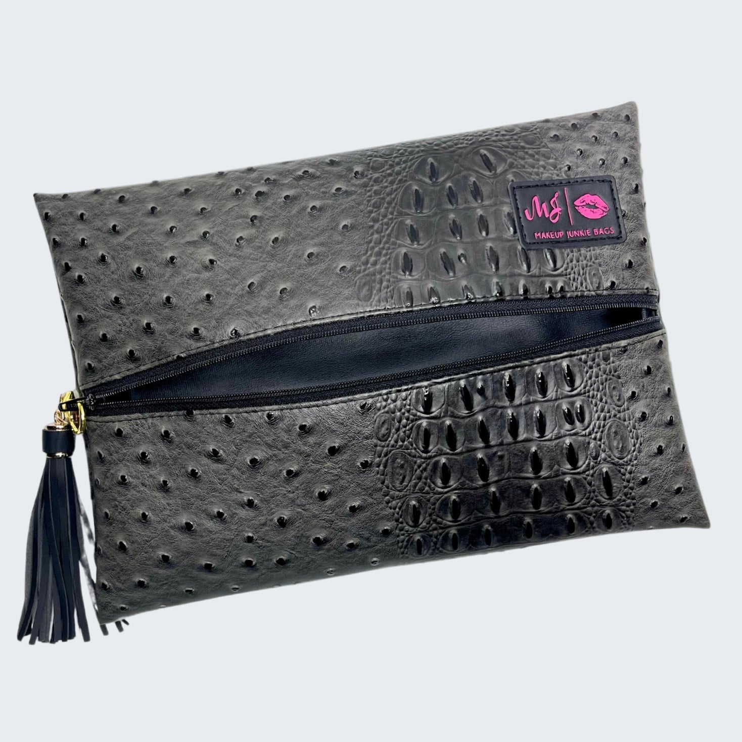 Black textured clutch bag with a visible brand logo on a white background