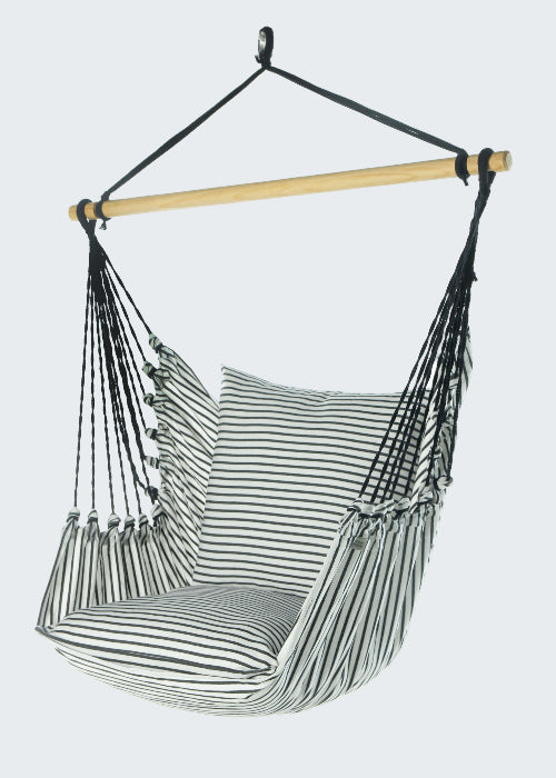 Striped hammock chair with wooden rod on a white background