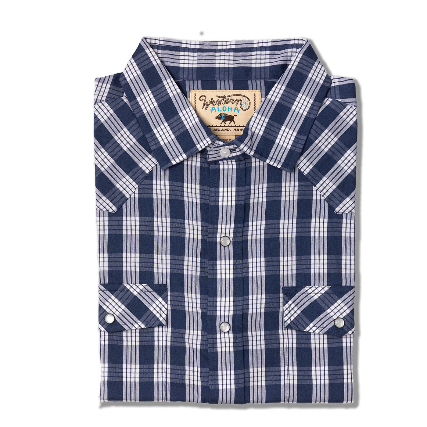 Folded blue and white plaid shirt with a brand label on a white background