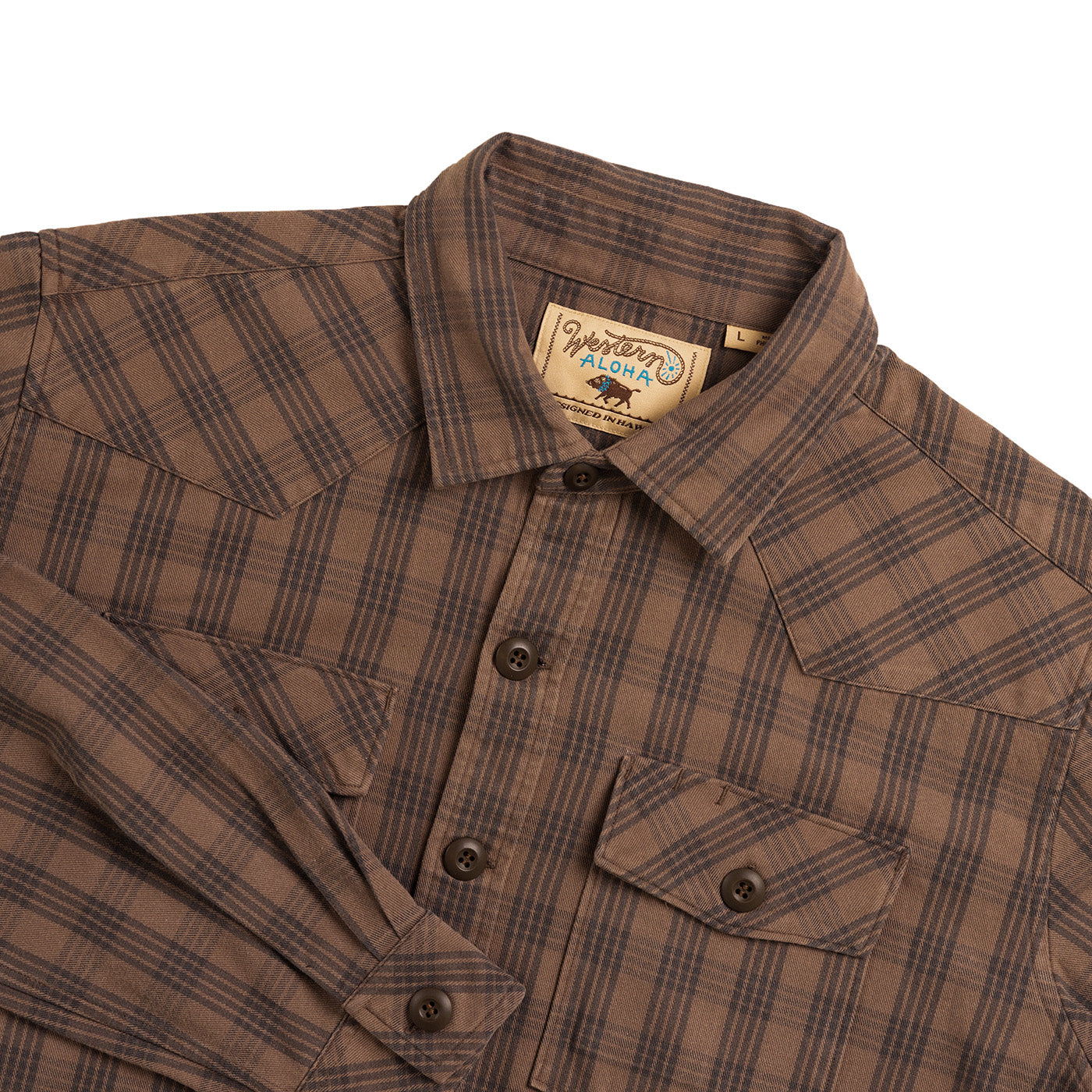 Brown plaid shirt with a visible brand tag on a white background