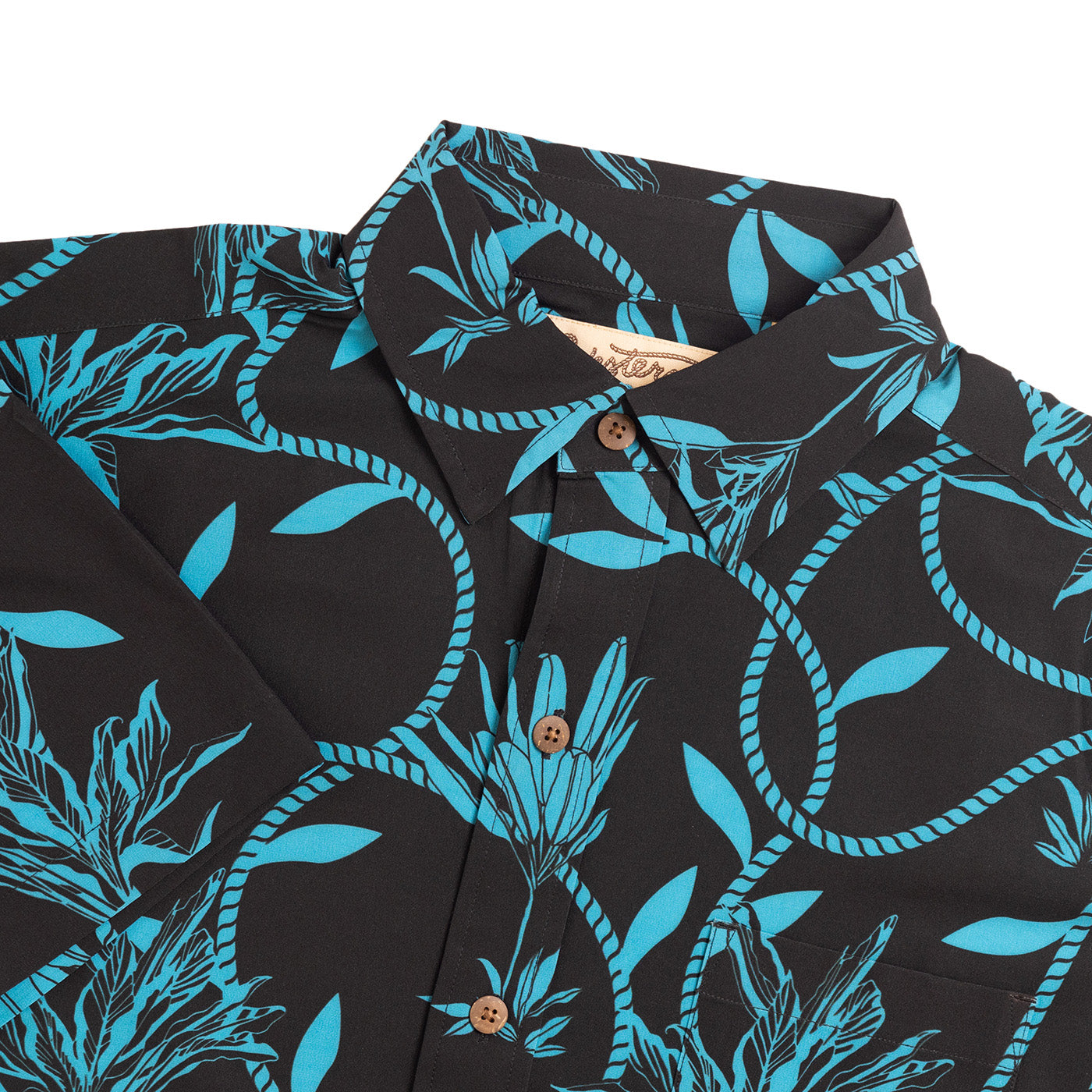 Black shirt with blue floral pattern on a white background