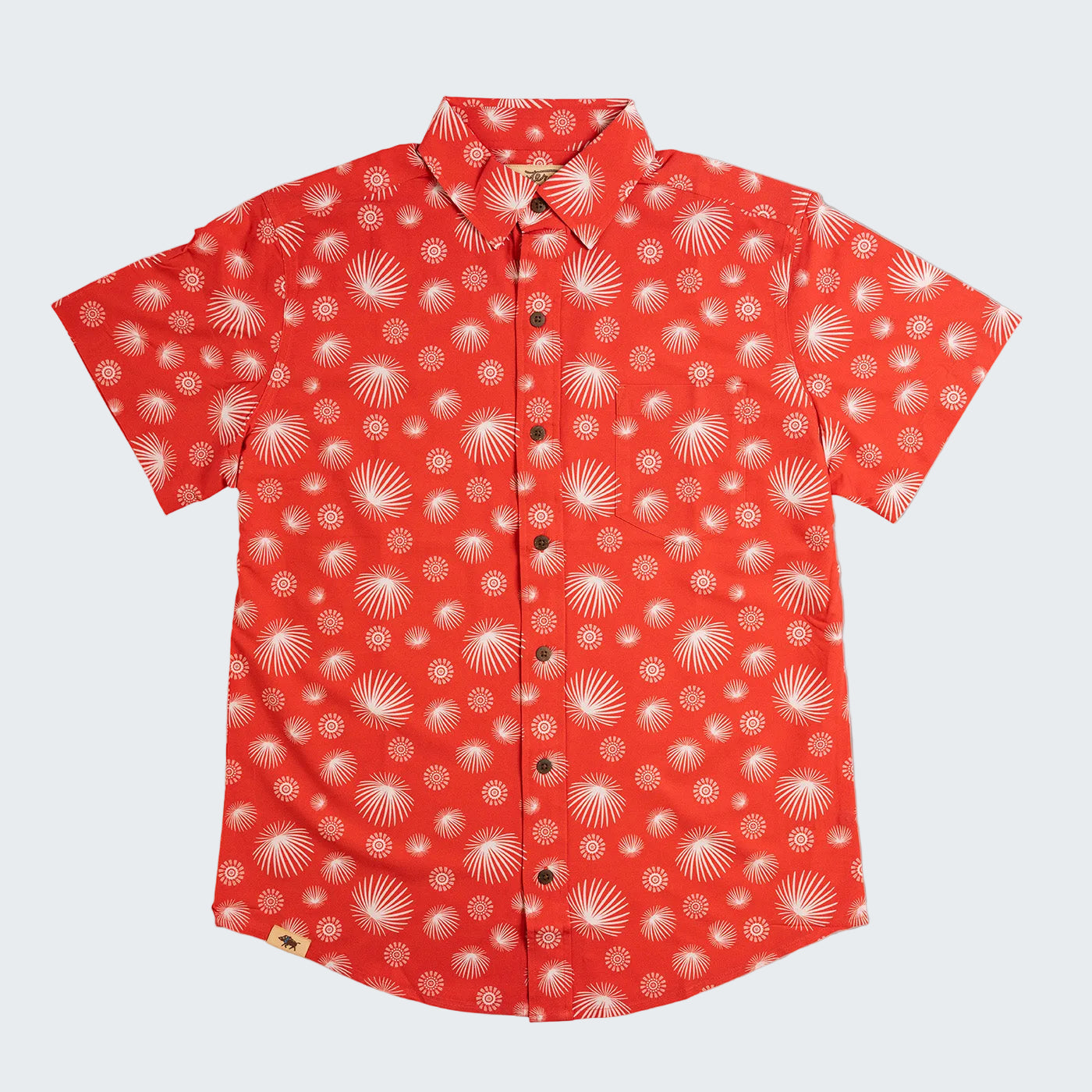 Red shirt with white shell pattern on a white background
