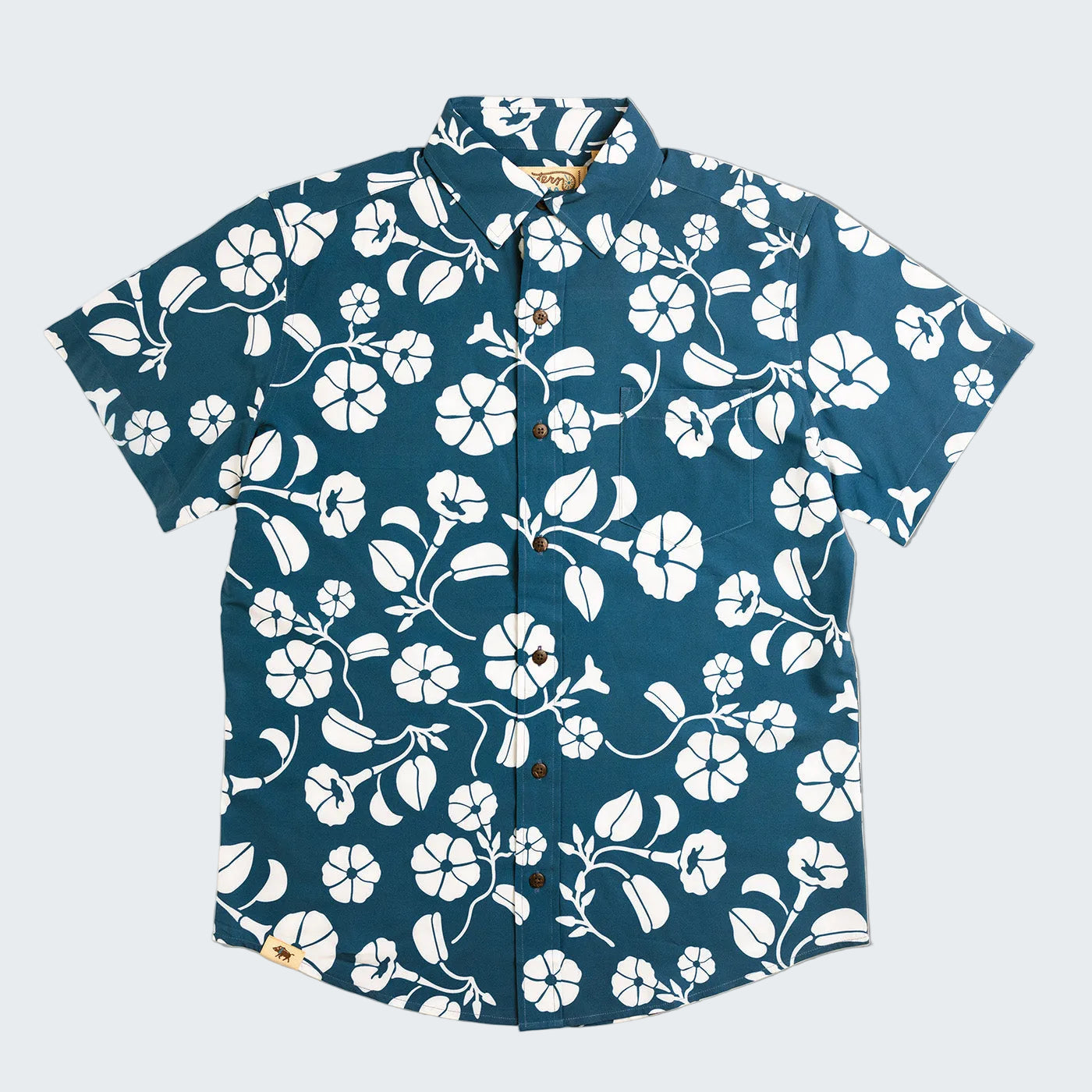 Blue shirt with white floral pattern on a white background