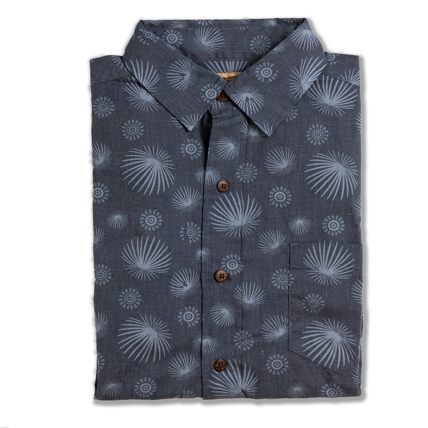 Folded shirt with a floral pattern on a white background