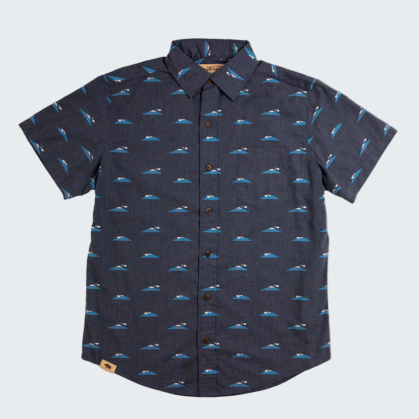 Navy blue shirt with boat pattern on a white background