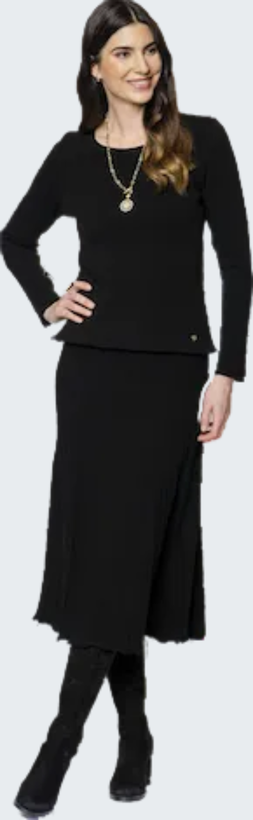 Woman wearing a black outfit with a plain background