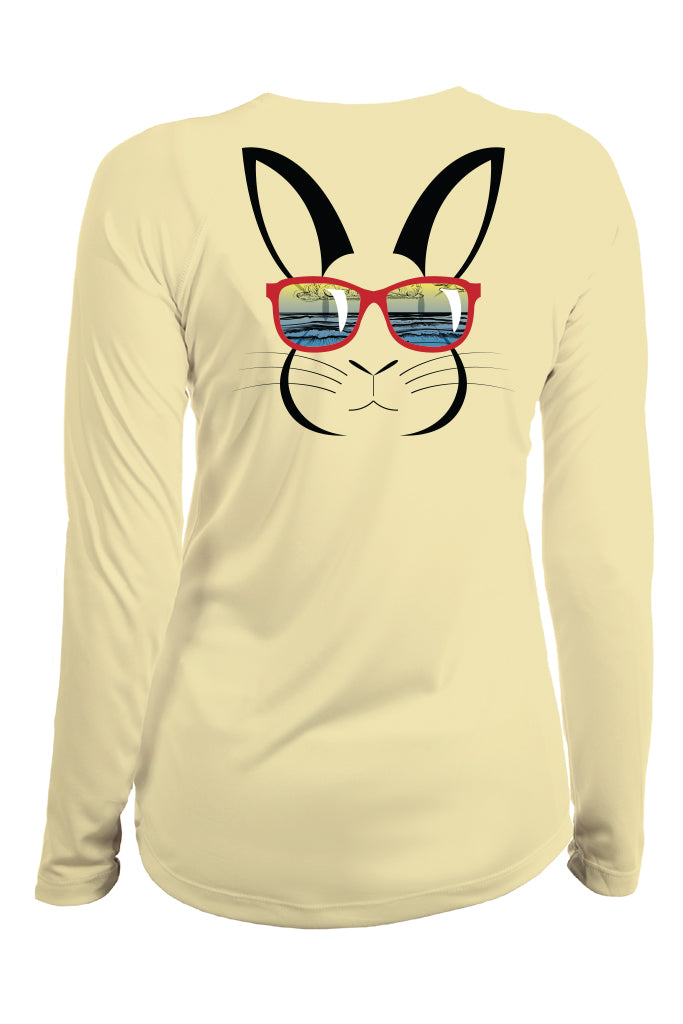 Beige long-sleeve shirt with a rabbit wearing sunglasses graphic on a white background