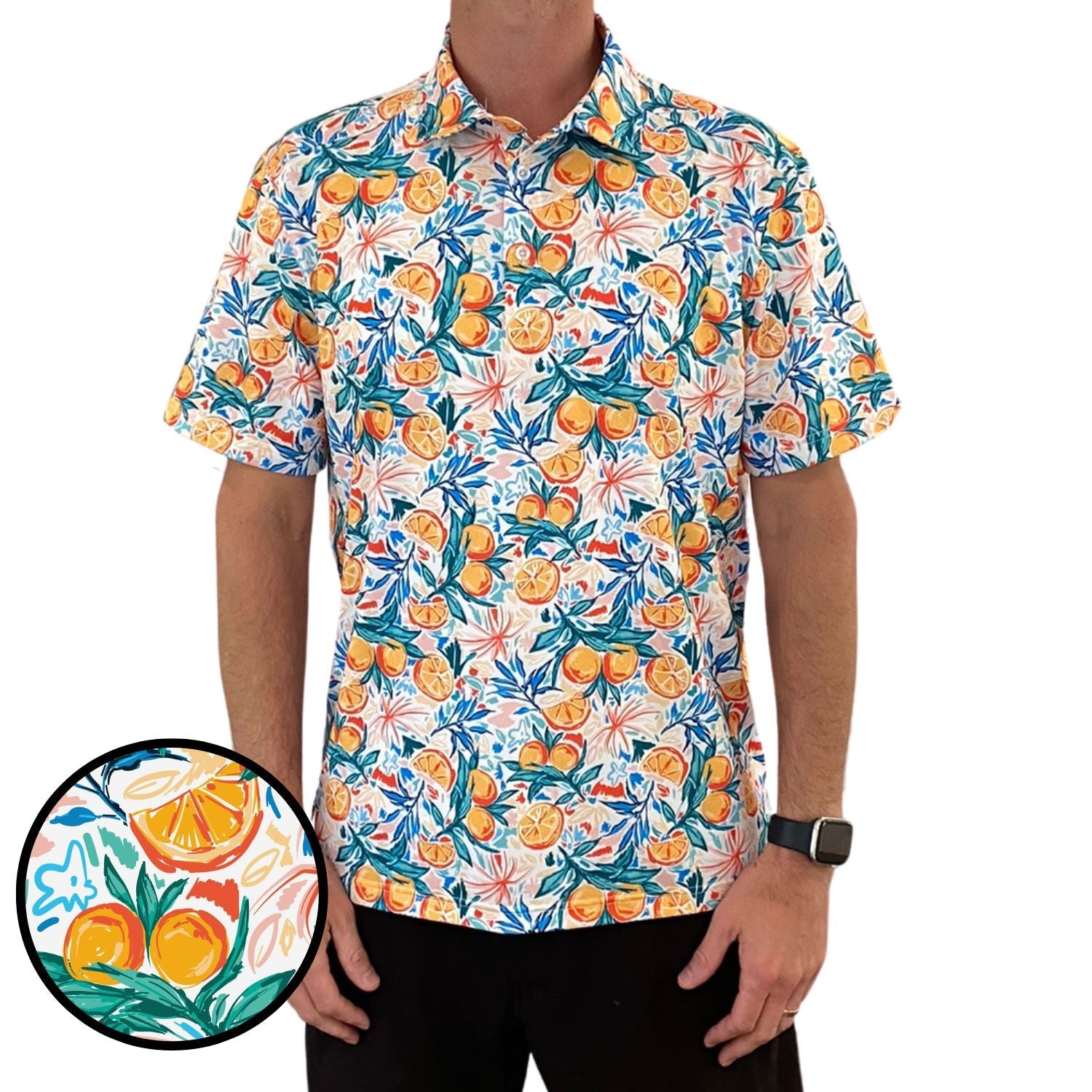 Person wearing a colorful shirt with fruit pattern, close-up inset of pattern.
