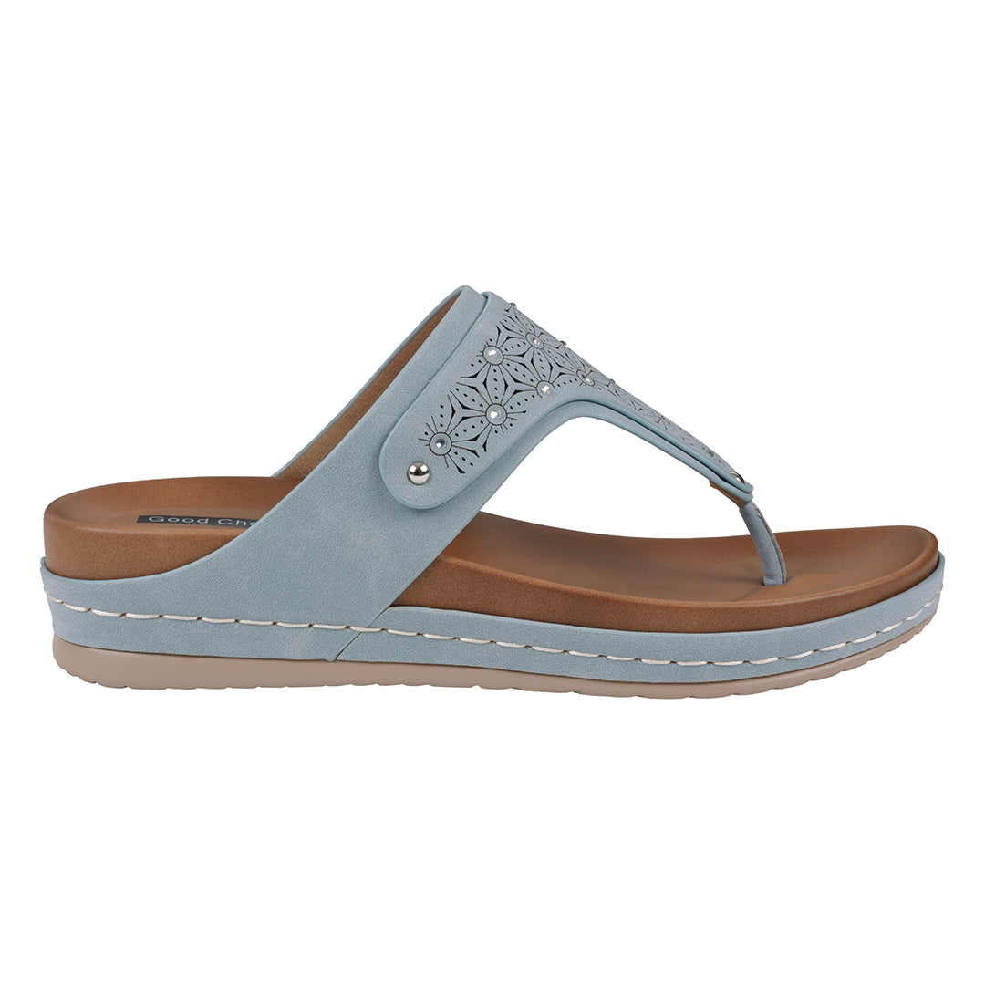 Light blue sandal with a brown sole on a white background