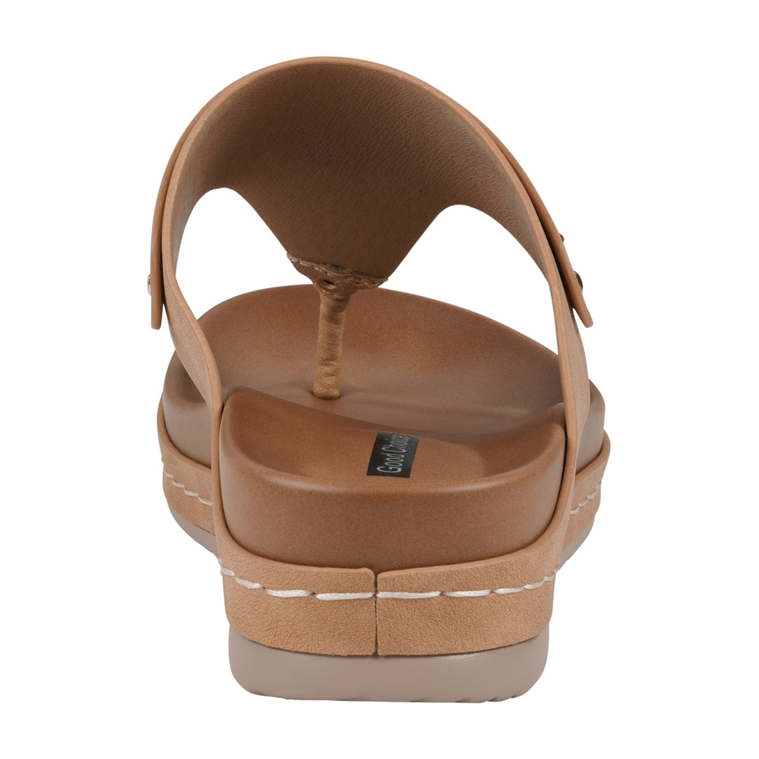 Tan sandal on a white background