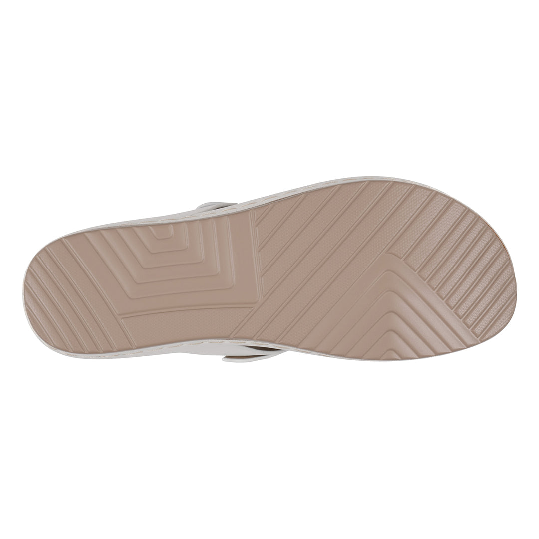 Beige sole of a shoe on a white background