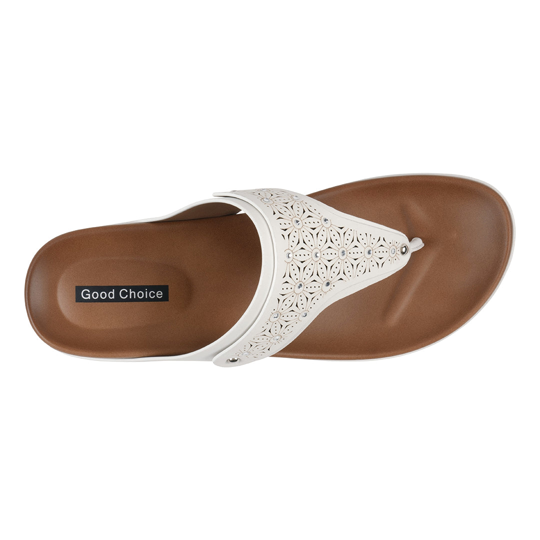 White sandal with brown sole on a white background