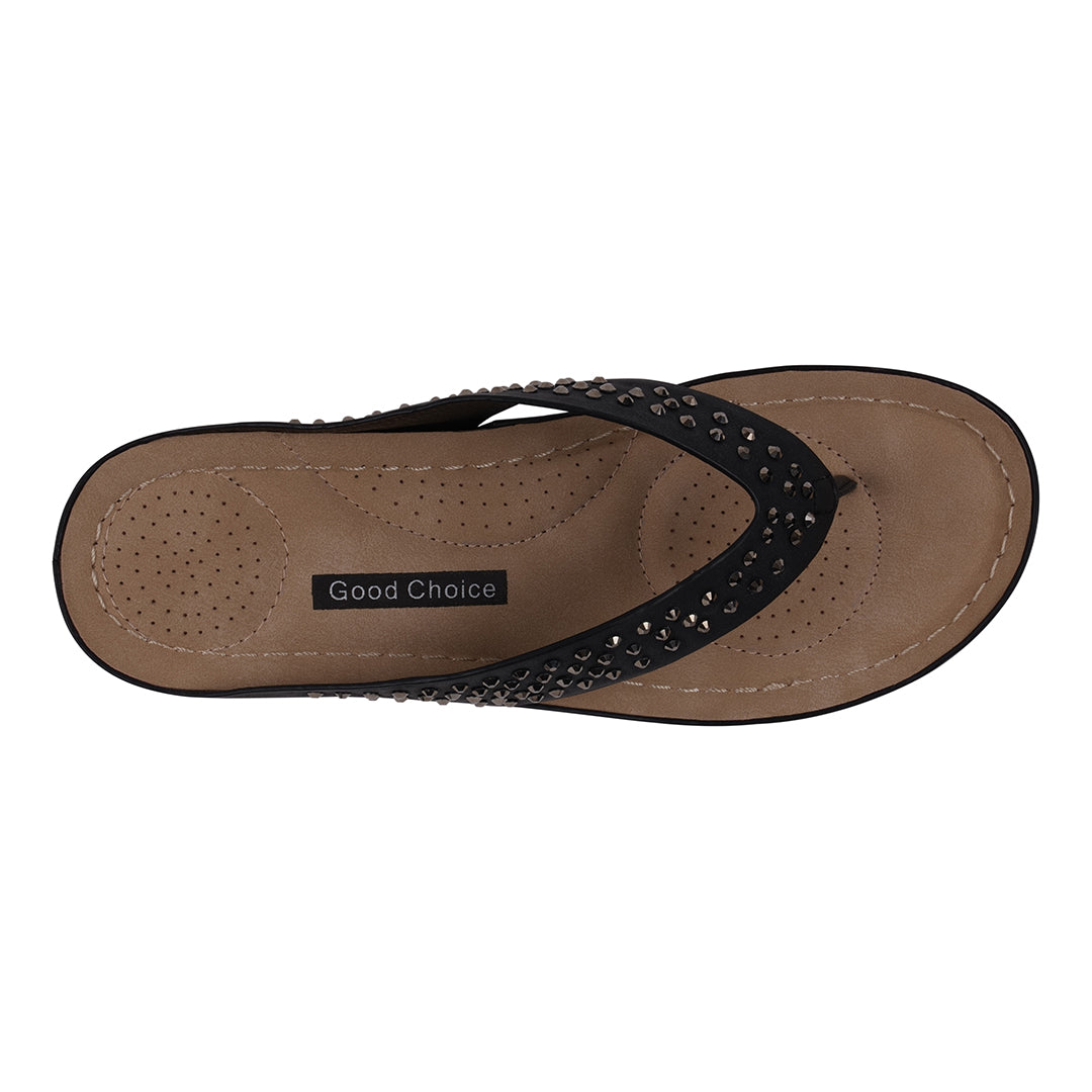 Brown sandal with black straps on a white background