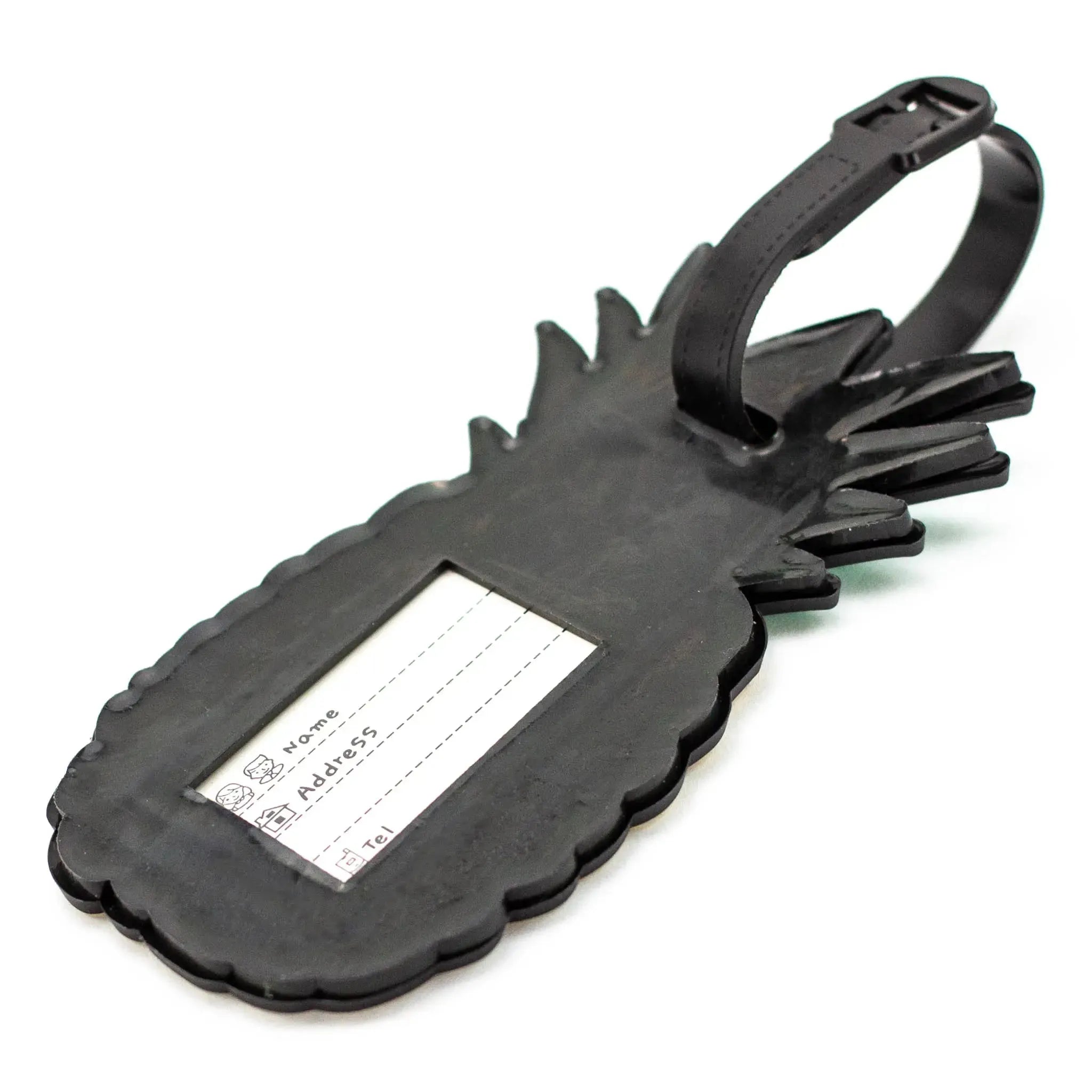 Black pineapple-shaped luggage tag with a label on a white background