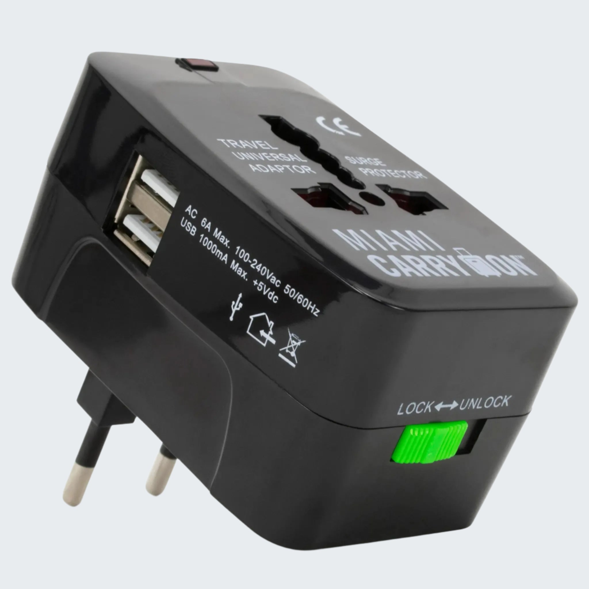 Black travel adapter with multiple sockets and USB port on a white background