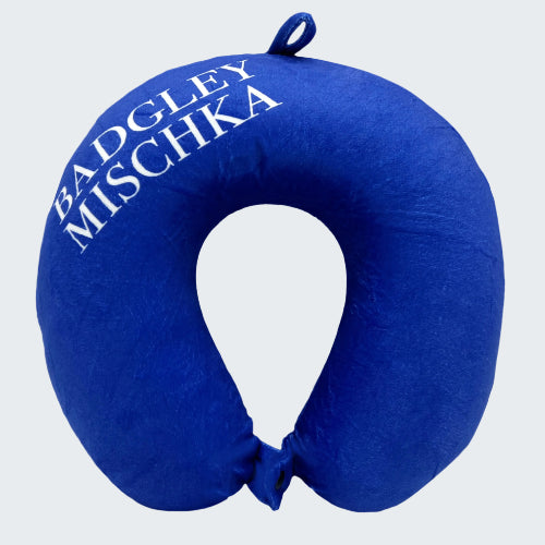 Blue neck pillow with 'Badgley Mischka' branding on a white background
