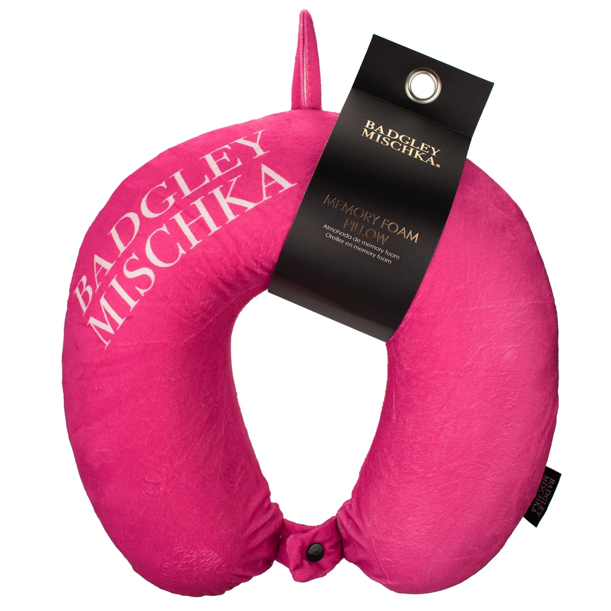 Pink neck pillow with 'Badgley Mischka' branding on a white background