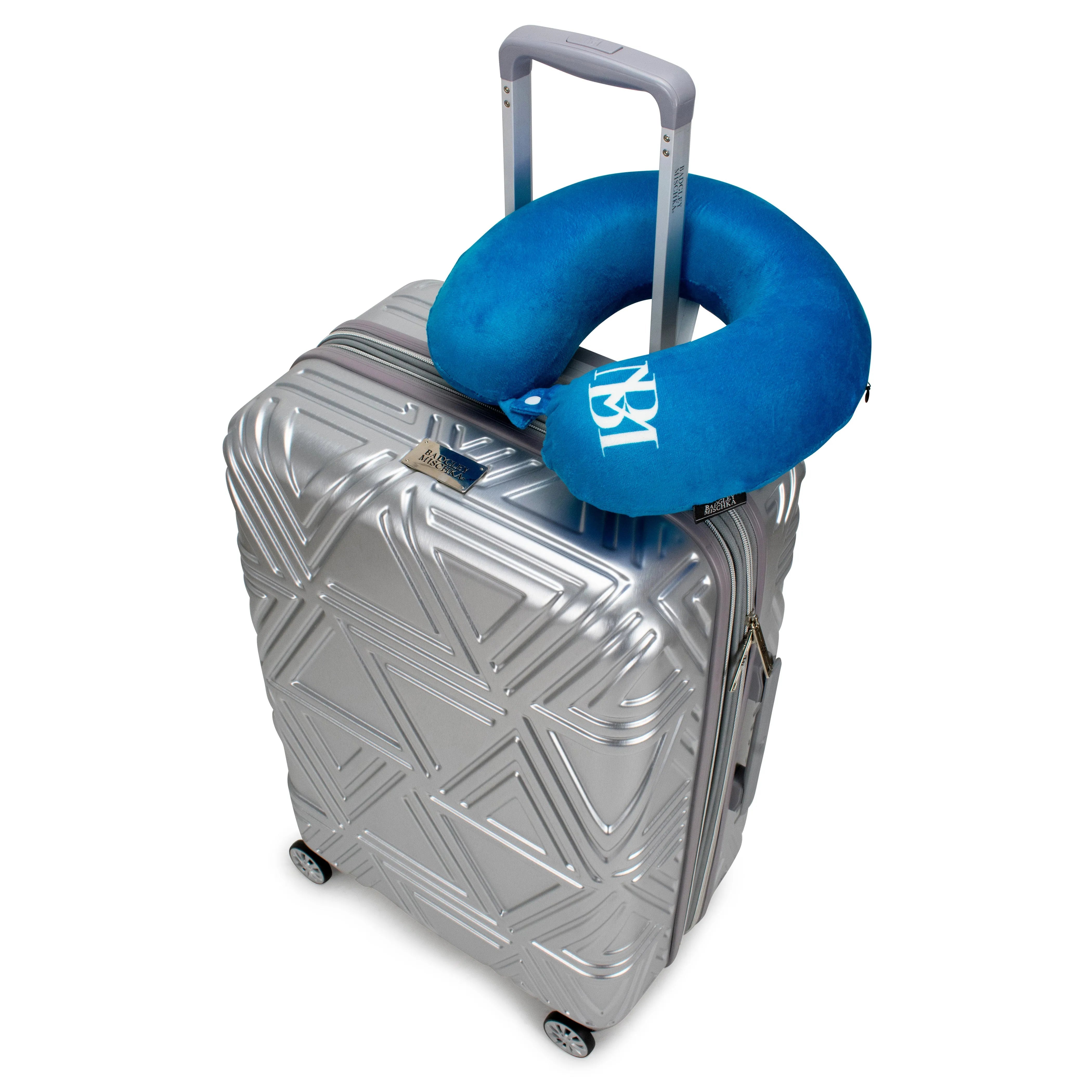 Silver suitcase with a blue cushion on top against a white background
