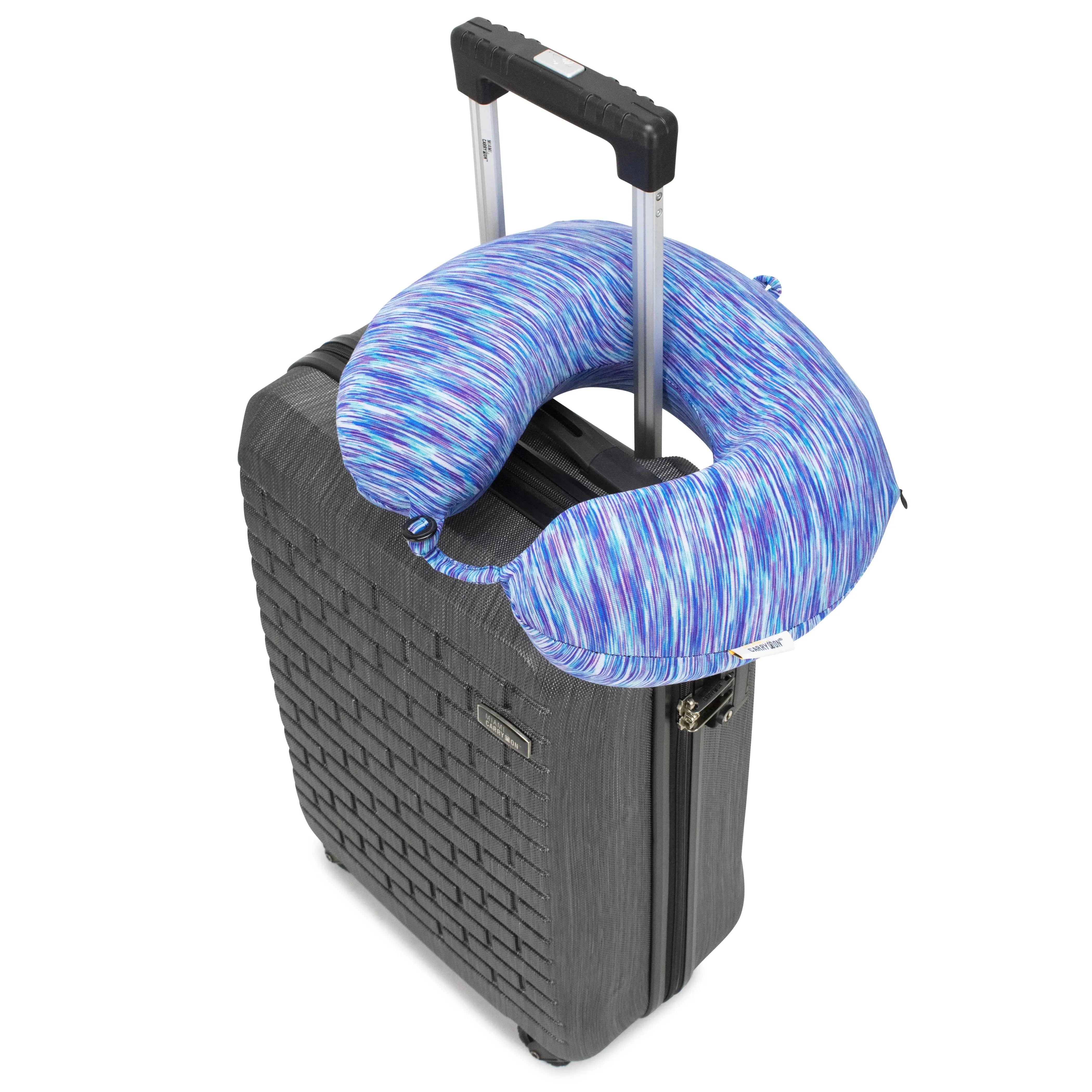 Blue neck pillow on a suitcase with a white background