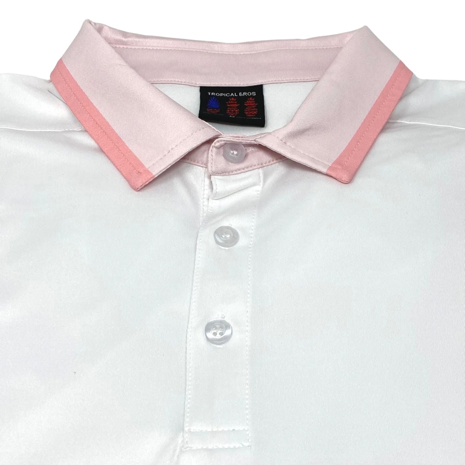 White shirt with pink collar and button details on a white background