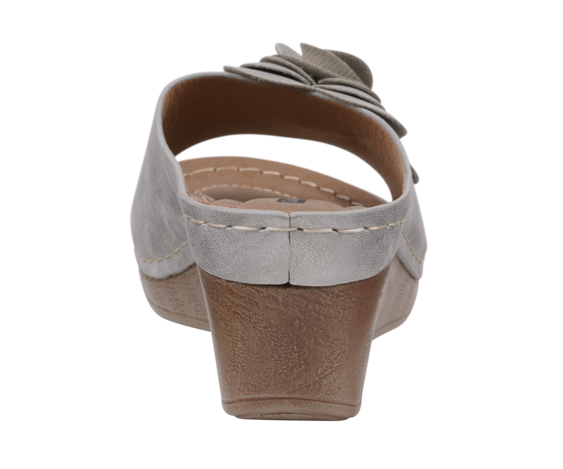 Wedge sandal with a bow on a white background