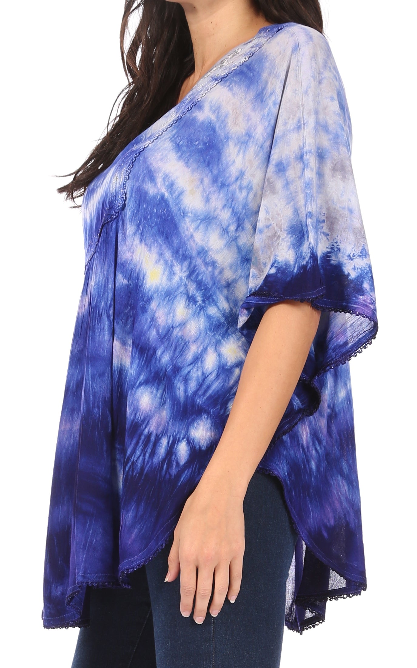 Blue and white tie-dye kimono-style top worn by a person on a white background