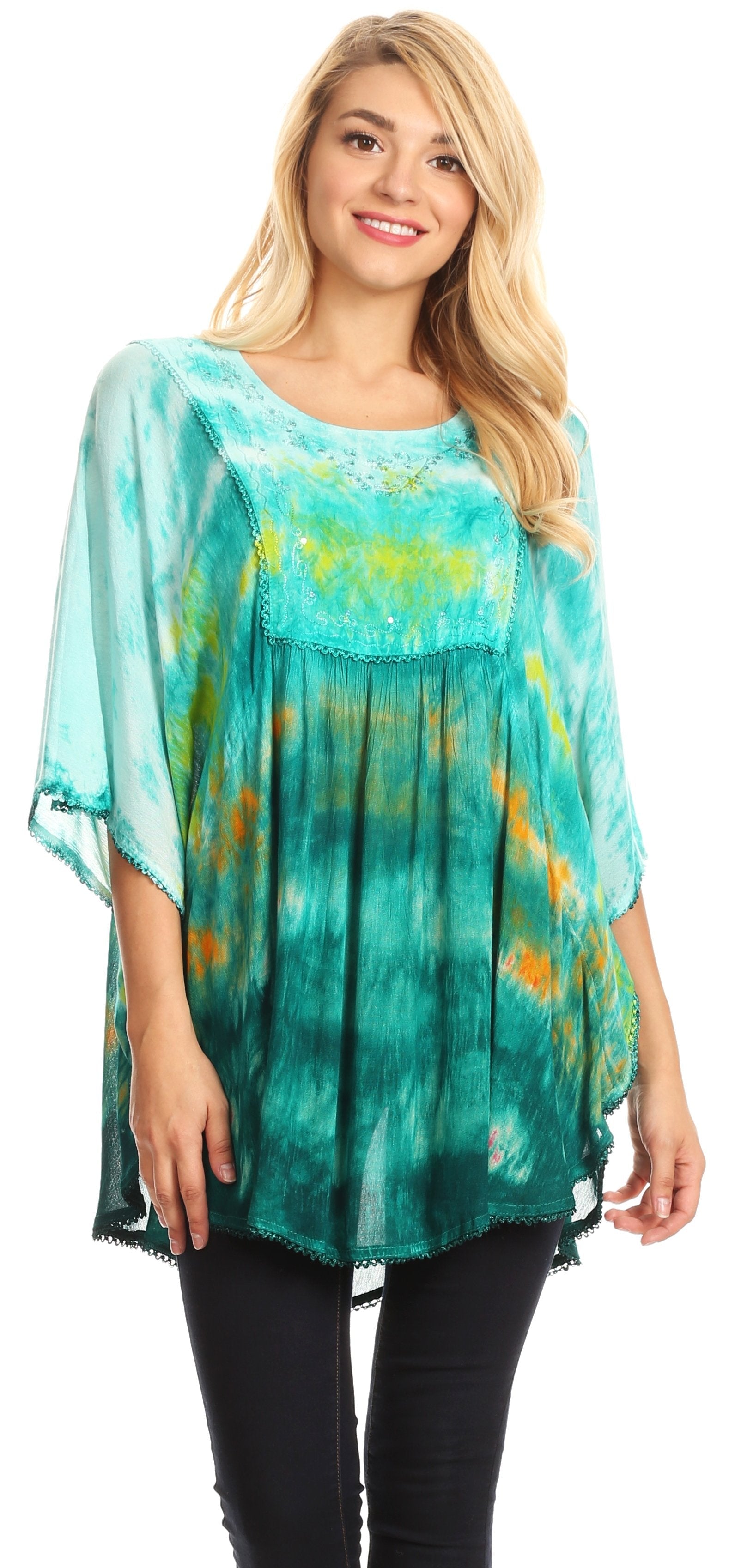 Woman wearing a teal and yellow tie-dye top on a white background