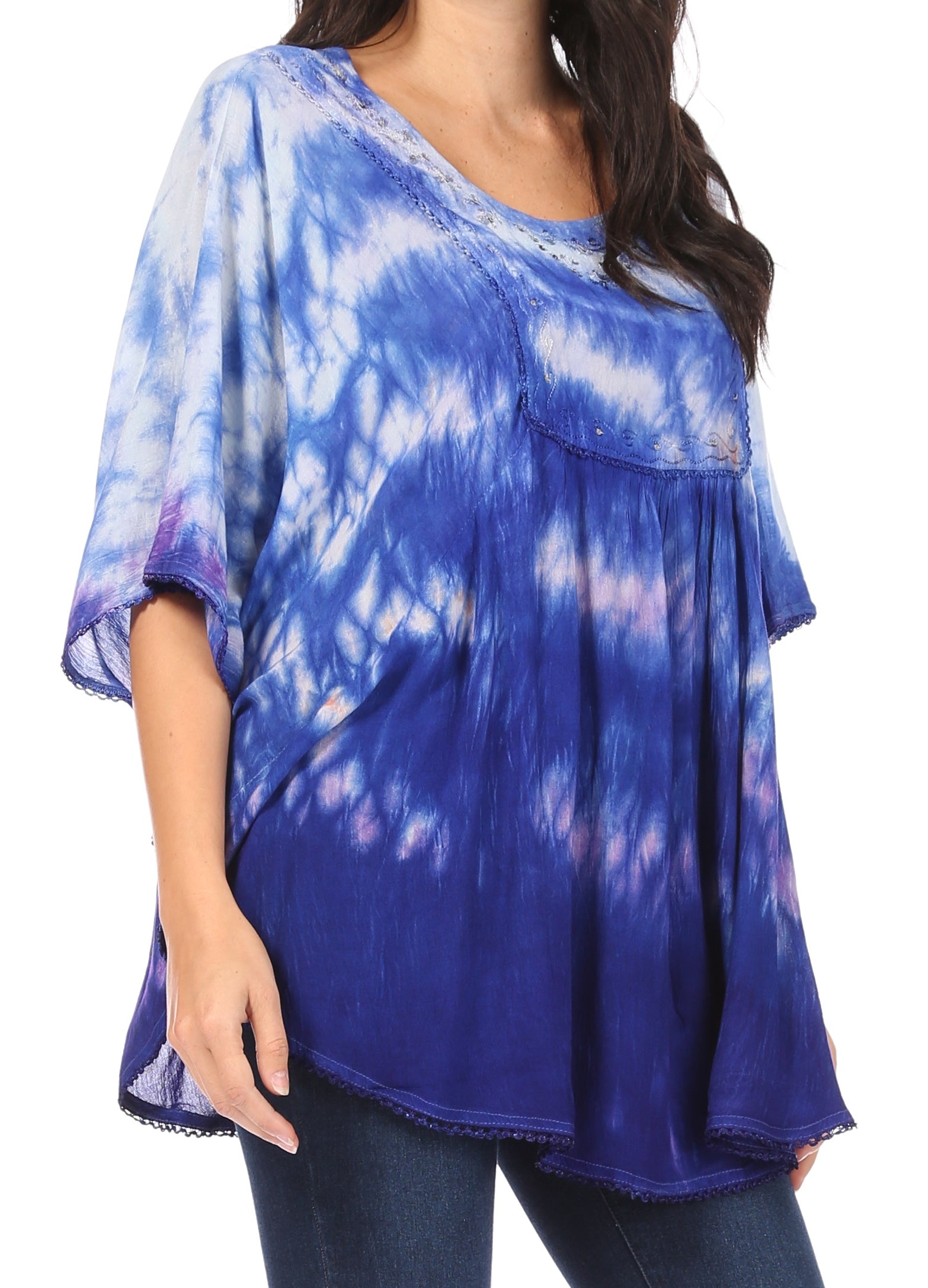Blue tie-dye shirt worn by a person on a white background