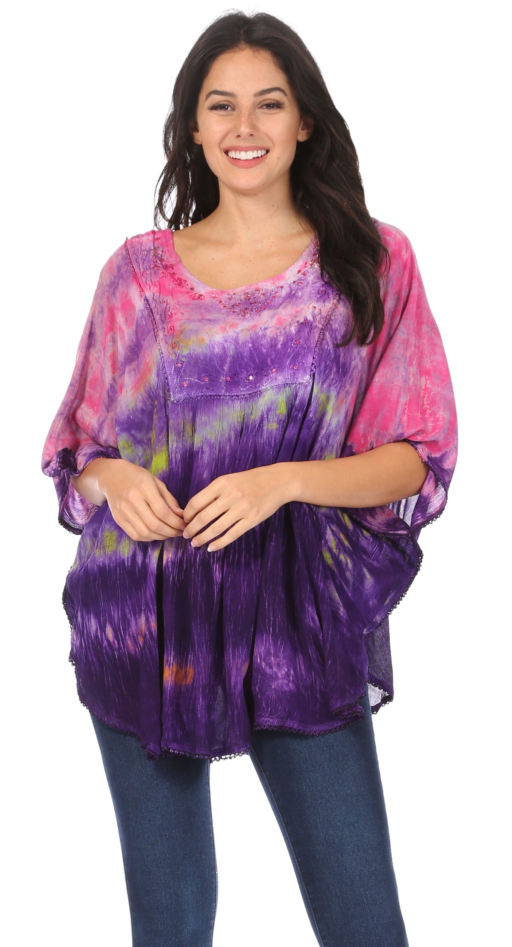 Woman wearing a colorful tie-dye shirt on a white background