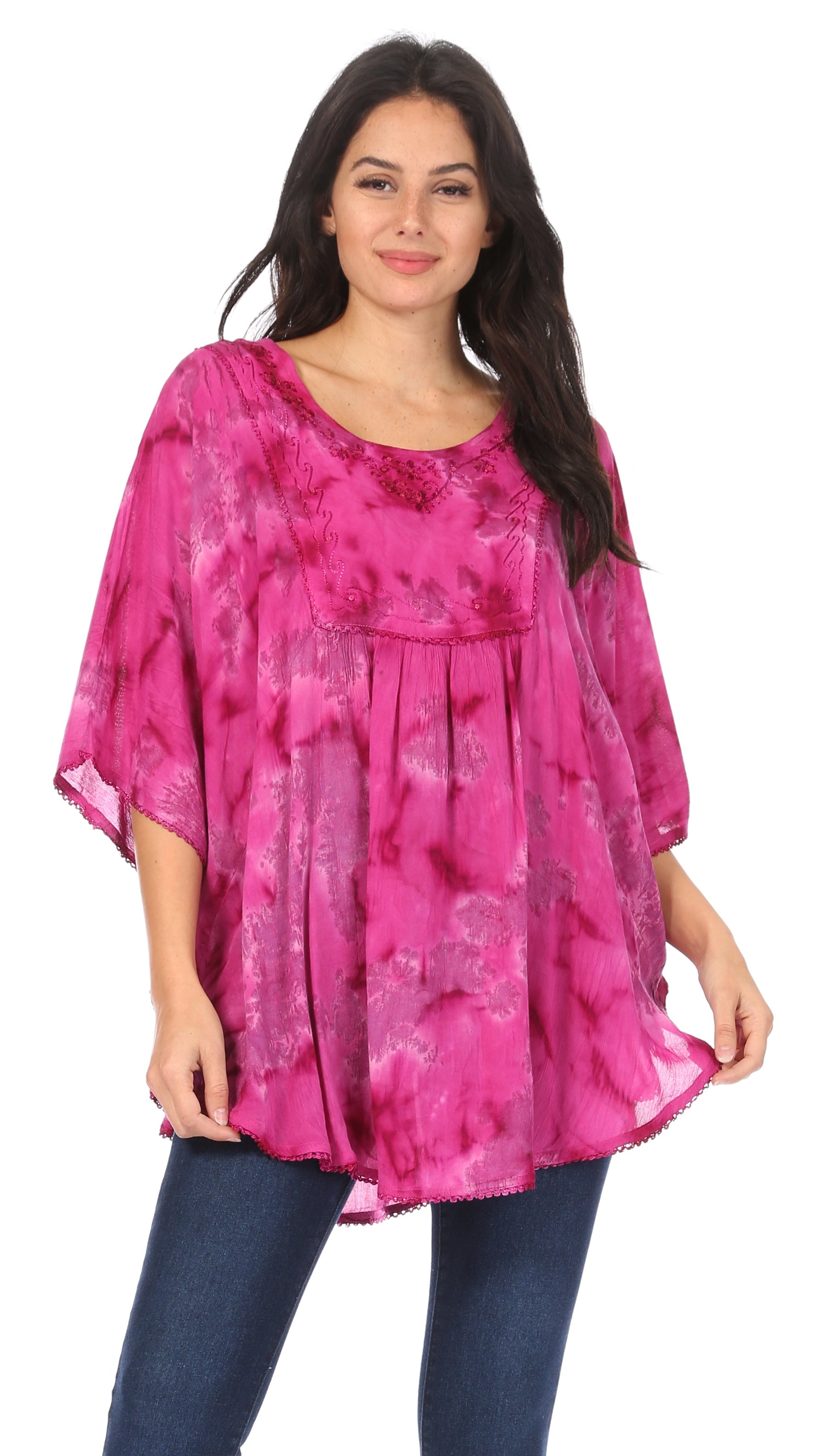 Woman wearing a pink tie-dye dress on a white background