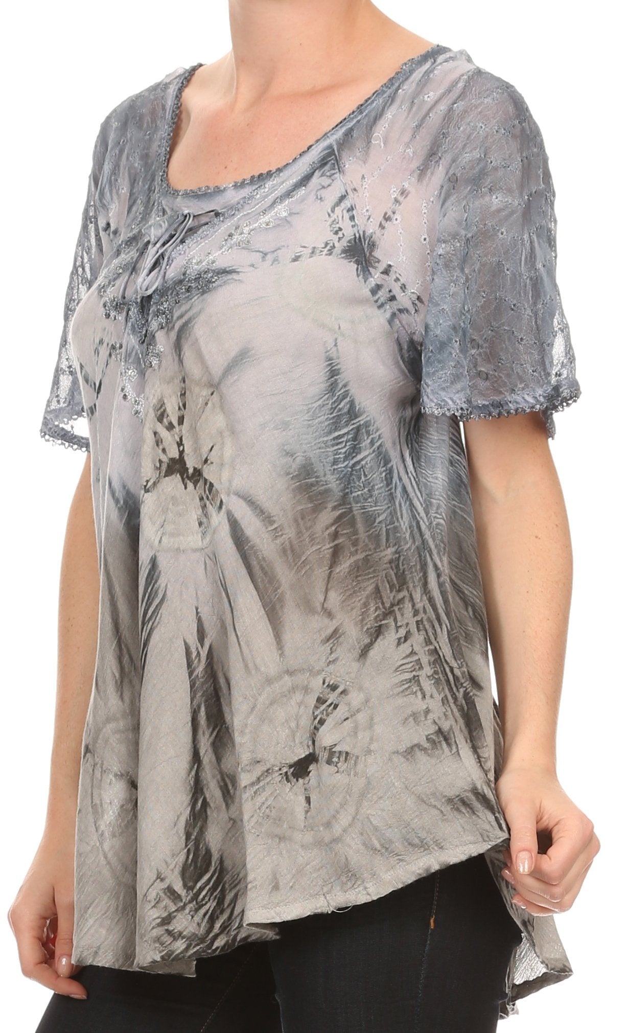 Woman wearing a patterned top on a white background