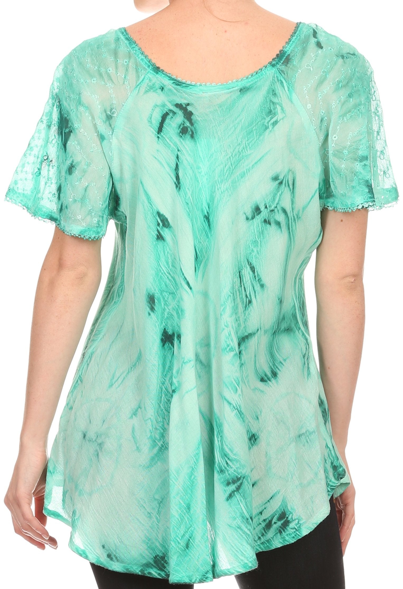 Green marbled tunic worn by a person on a white background