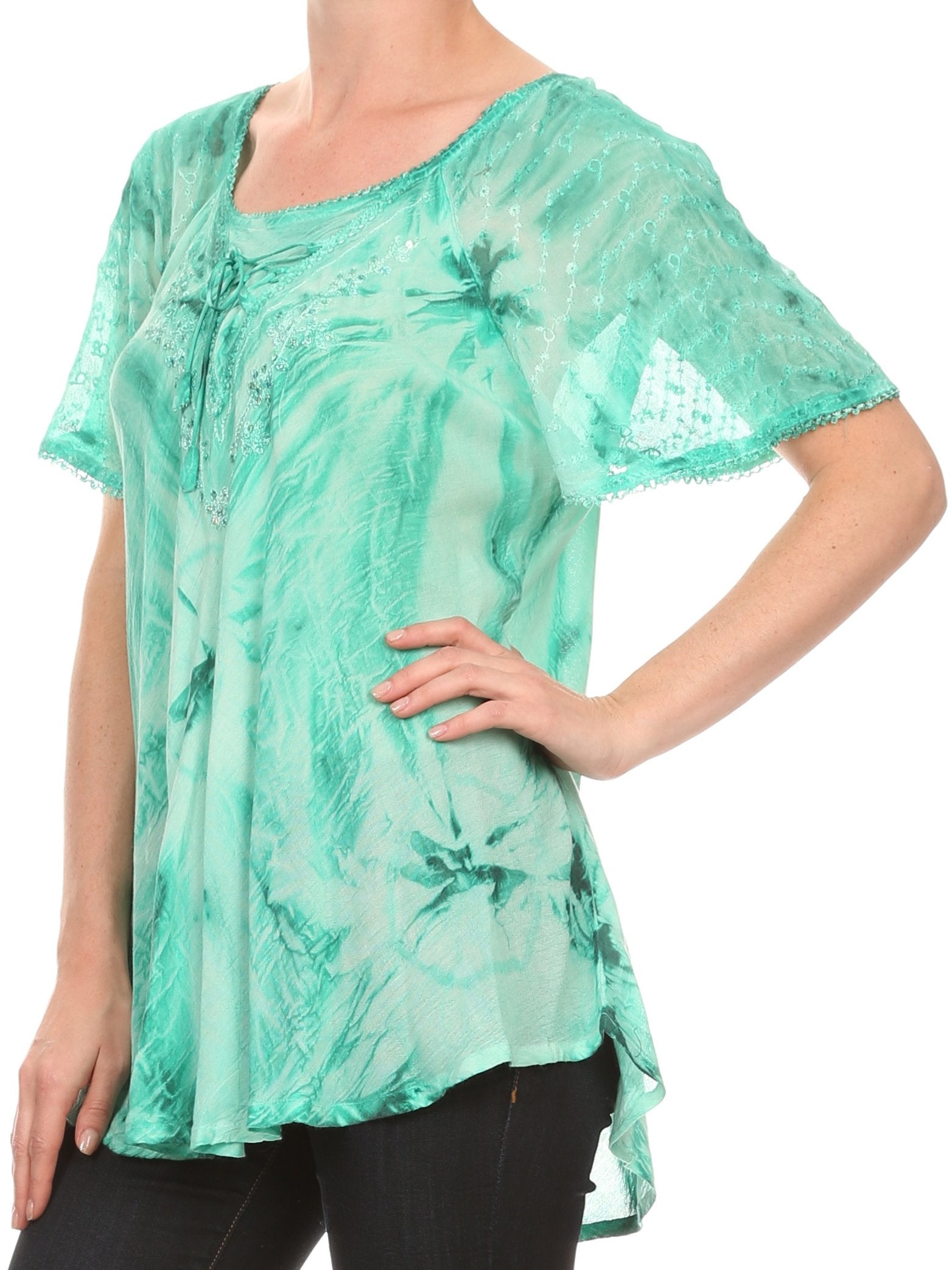 Green tie-dye shirt worn by a person on a white background