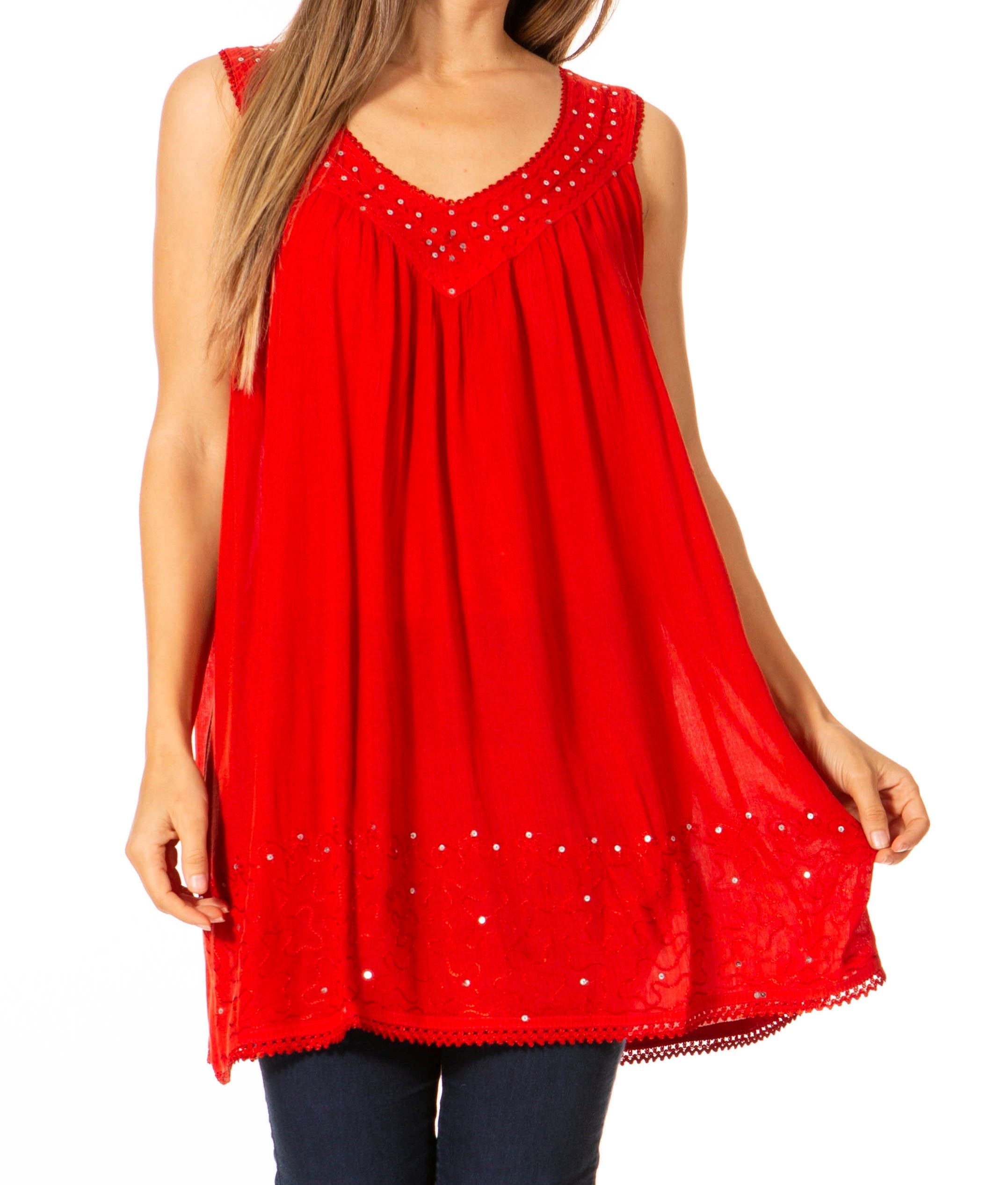 Red sleeveless top with white embellishments on a white background