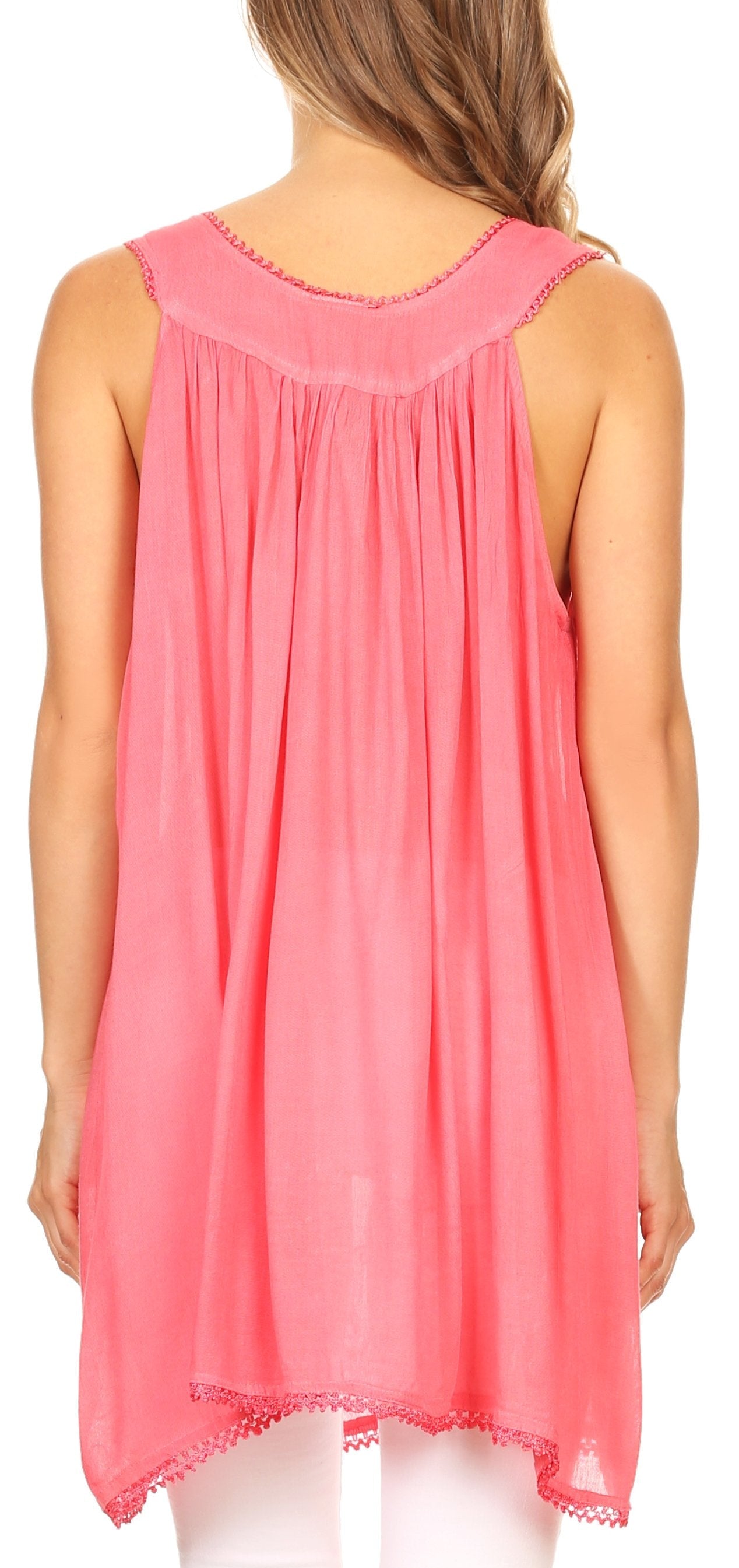 Woman wearing a pink sleeveless top on a white background