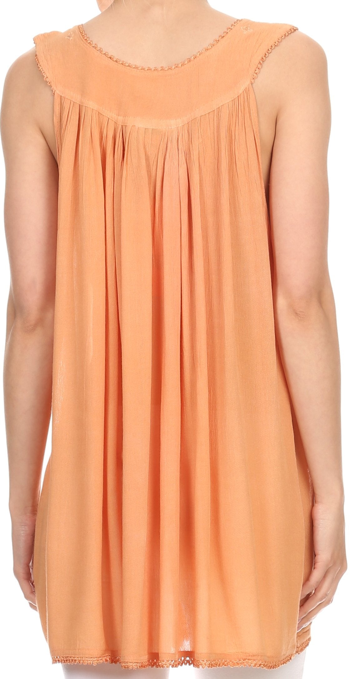 Orange sleeveless dress on a white background