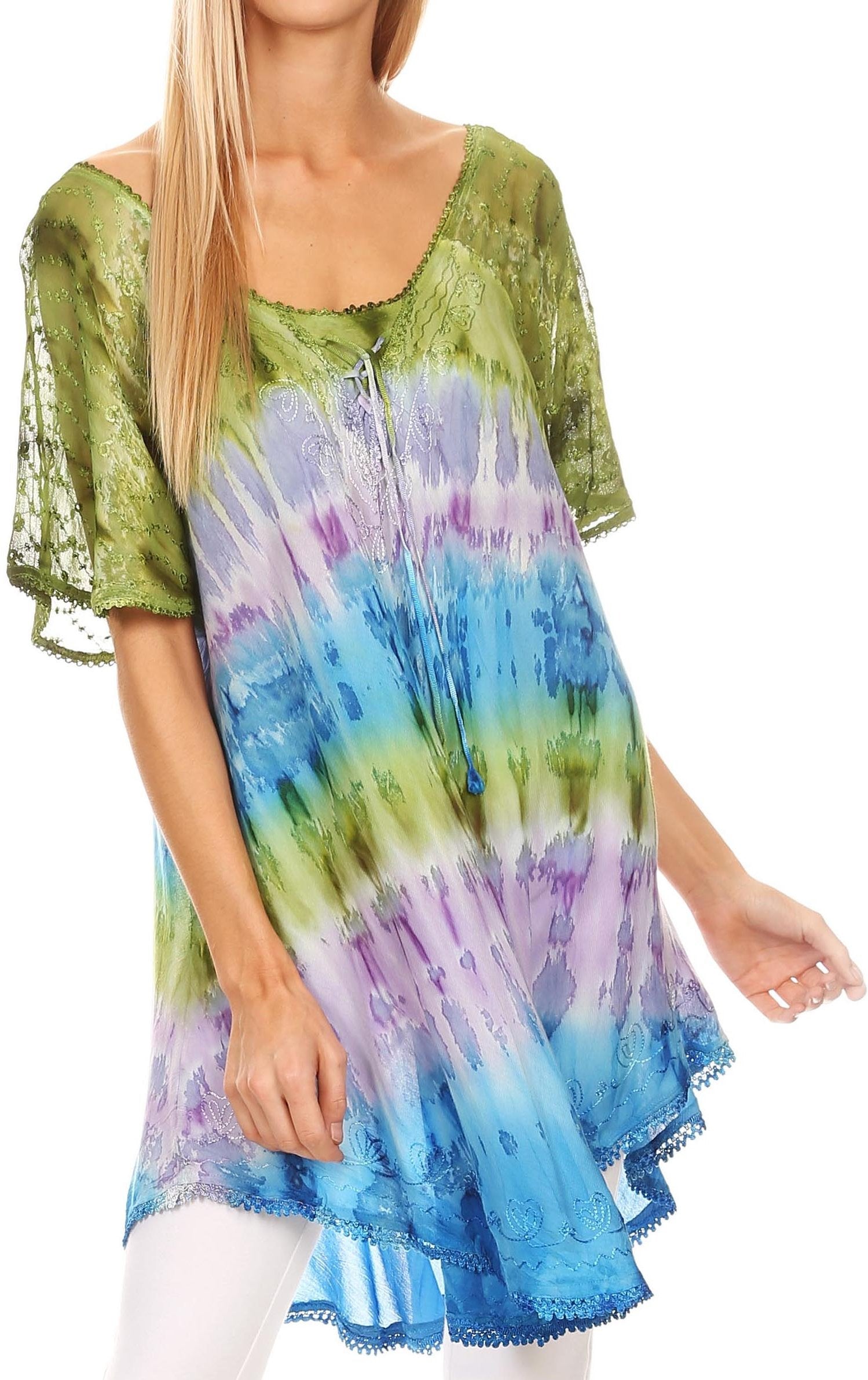 Woman wearing a colorful tie-dye dress with a green top and blue, purple, and green gradient skirt.
