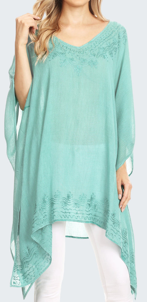 Mint green lace top worn by a model on a white background