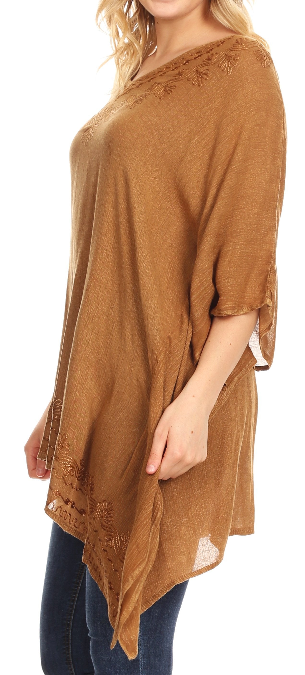 Brown long-sleeve top with lace details on a white background