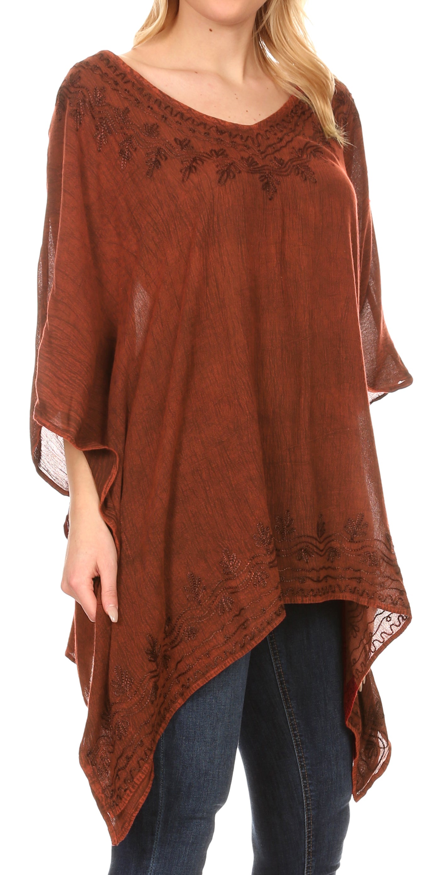 Brown lace top worn by a person on a white background