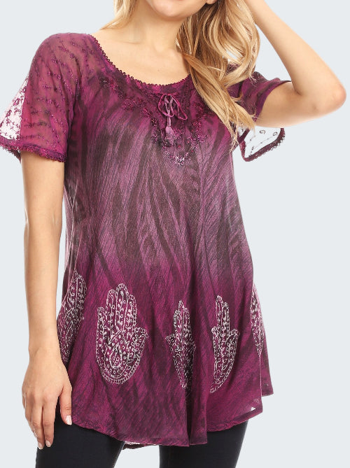 Purple lace top with hamsa hand designs on a white background