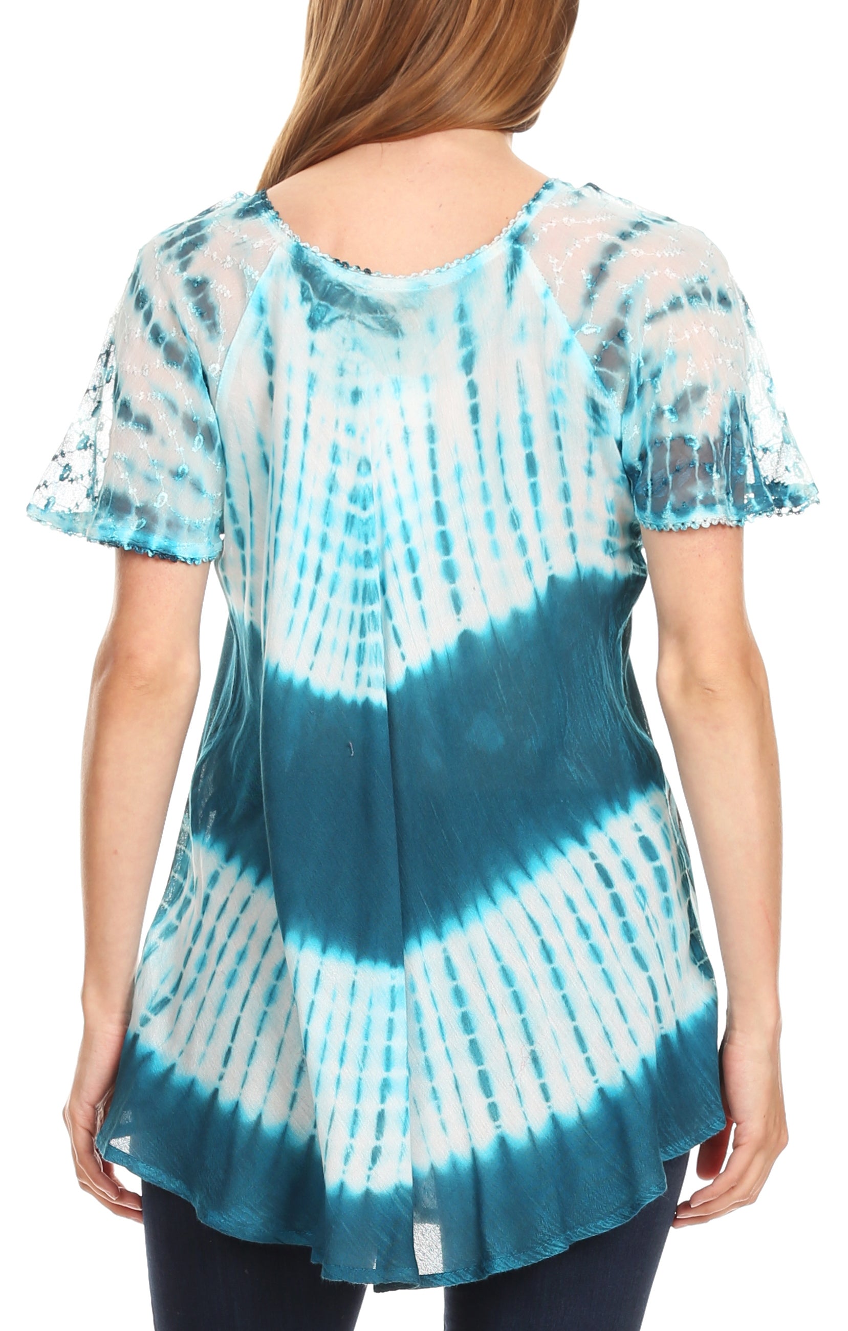 Woman wearing a blue and white tie-dye shirt on a white background
