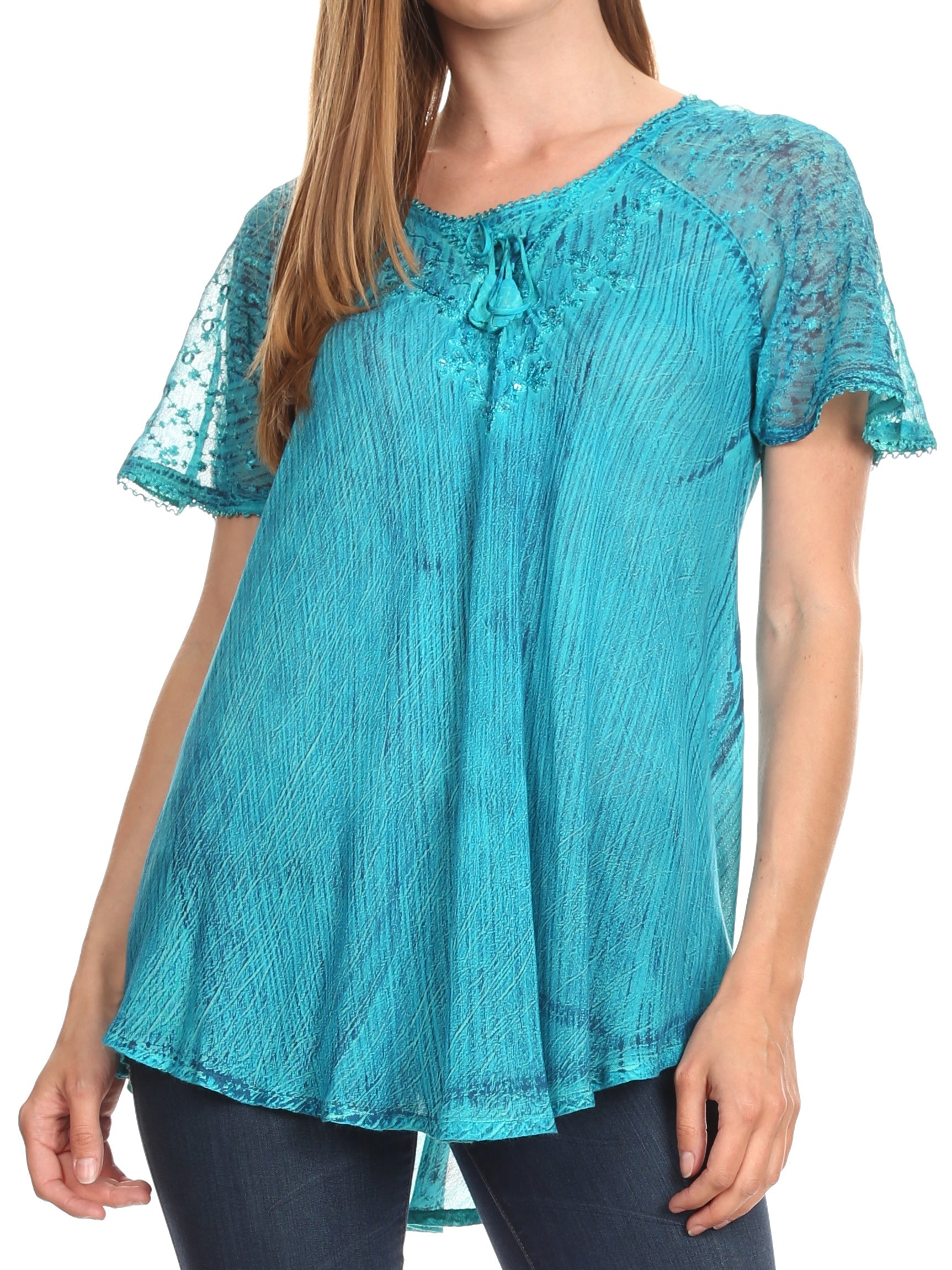 Teal lace top worn by a model on a white background