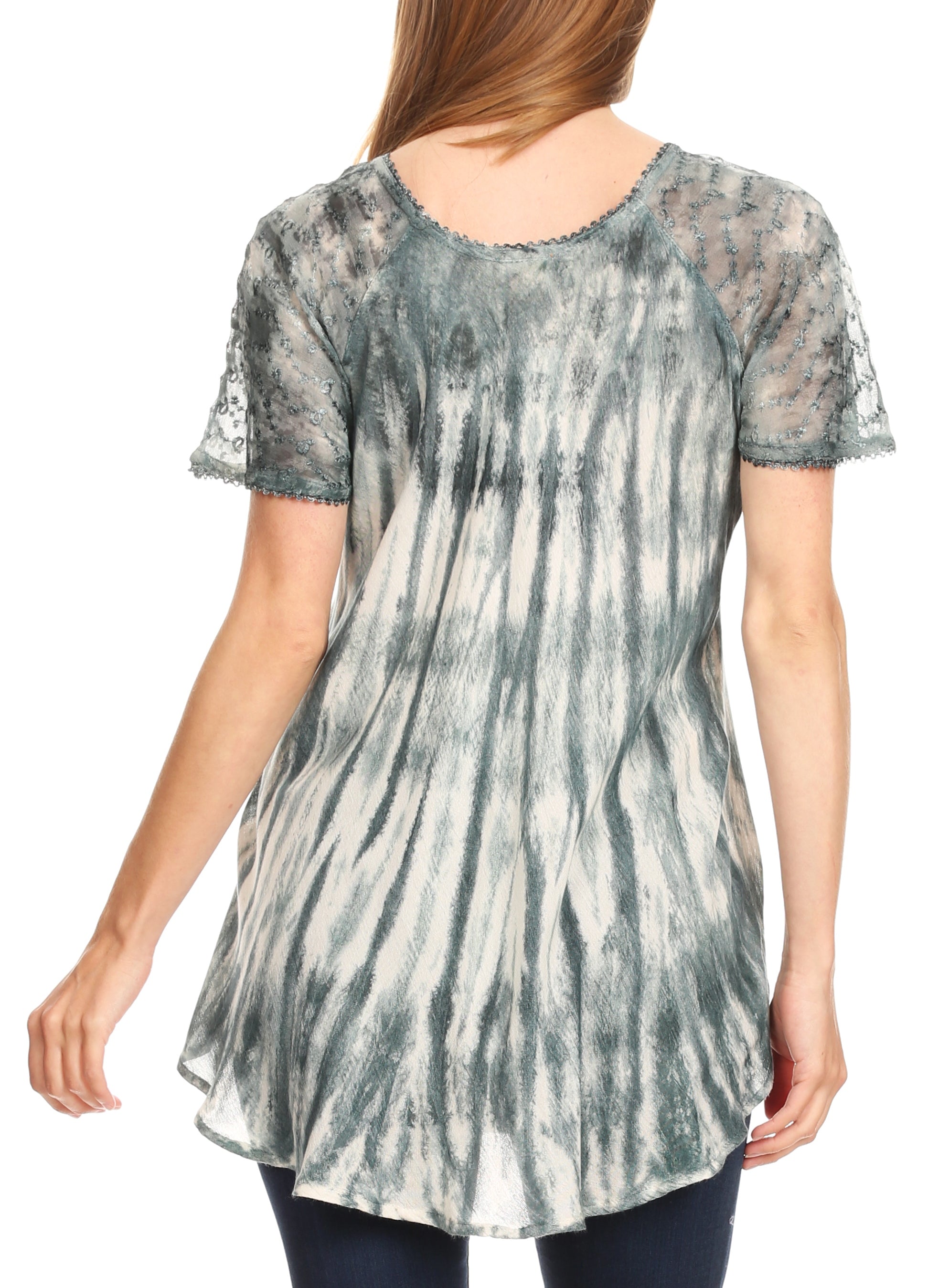 Tie-dye tunic with lace sleeves worn by a person on a white background