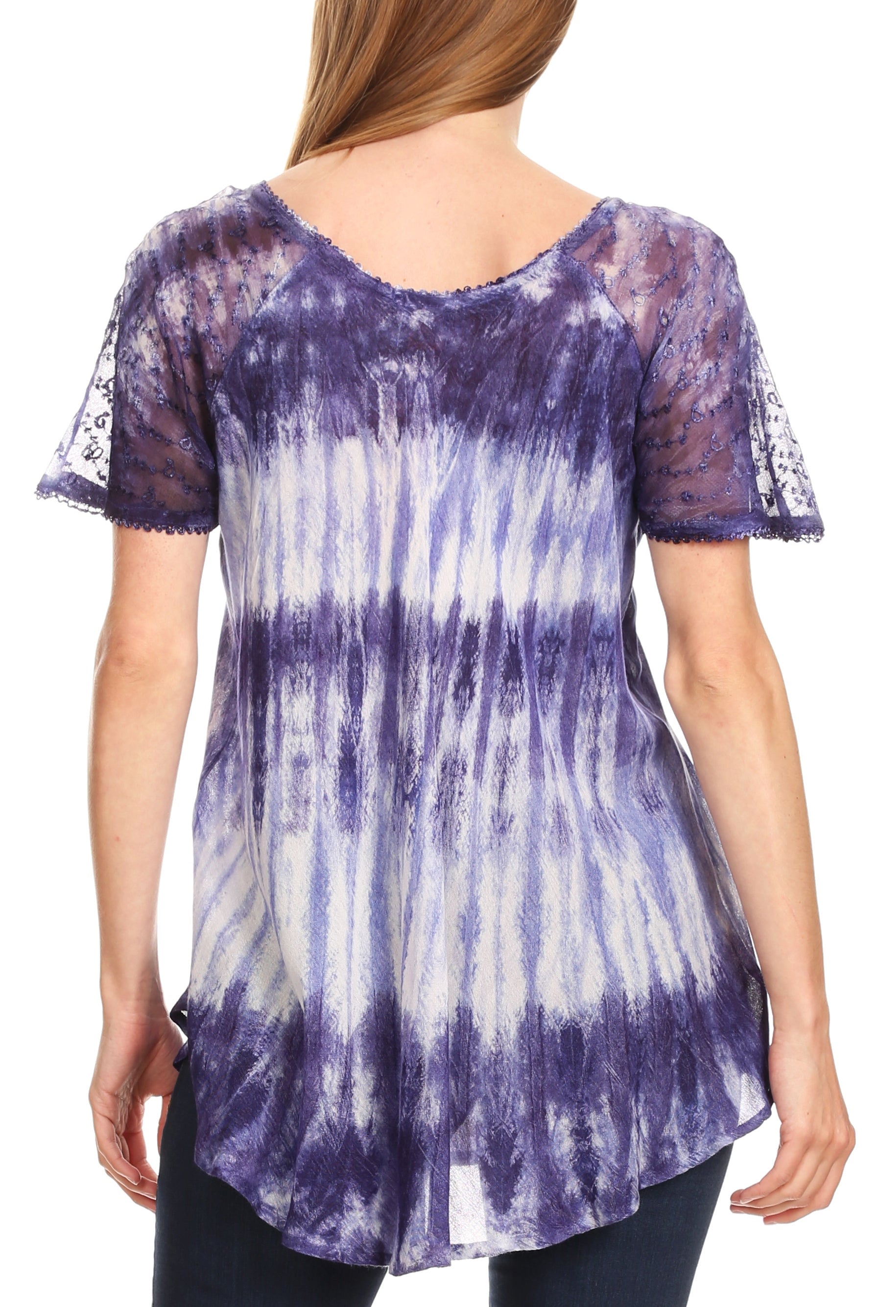 Woman wearing a purple and white tie-dye shirt with lace sleeves on a white background