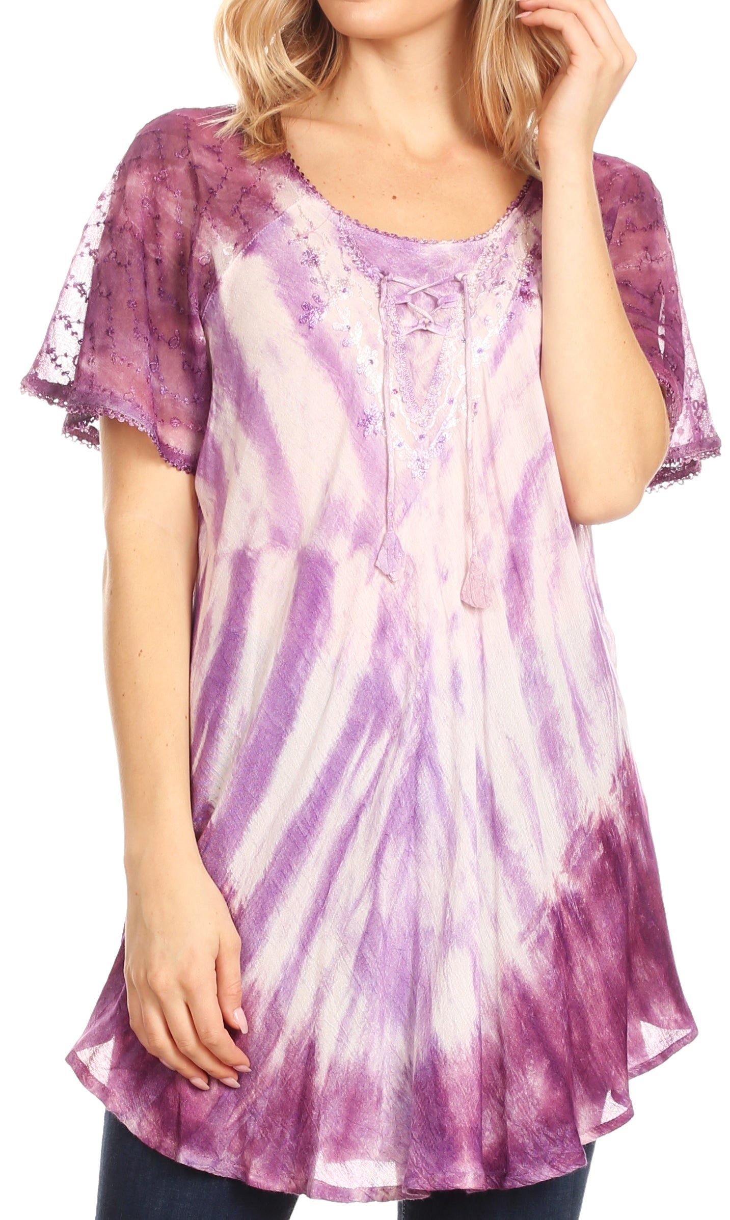 Woman wearing a tie-dye shirt with purple and white colors
