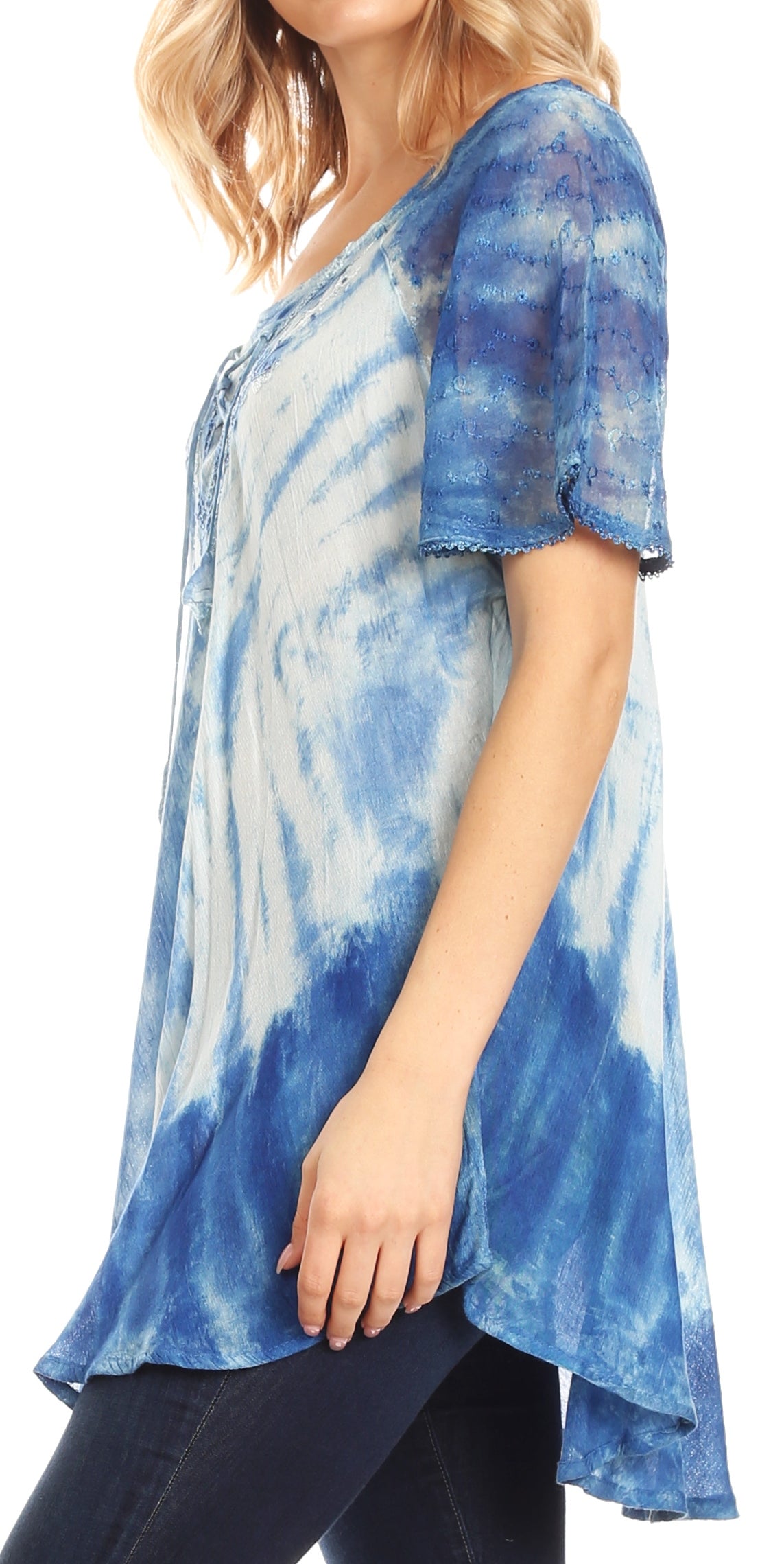 Blue tie-dye shirt worn by a person on a white background