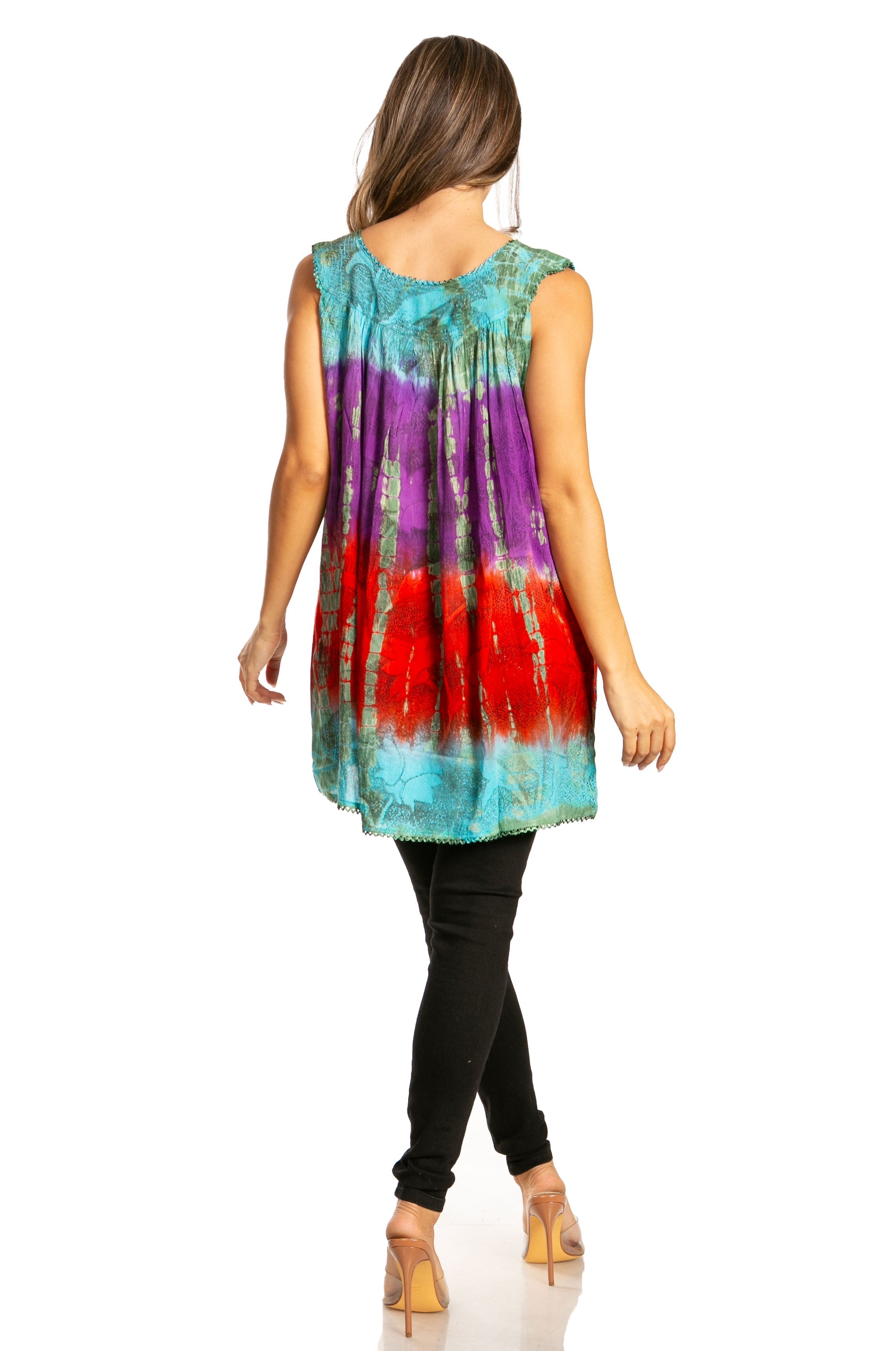 Woman wearing a tie-dye sleeveless dress with a colorful gradient on a white background