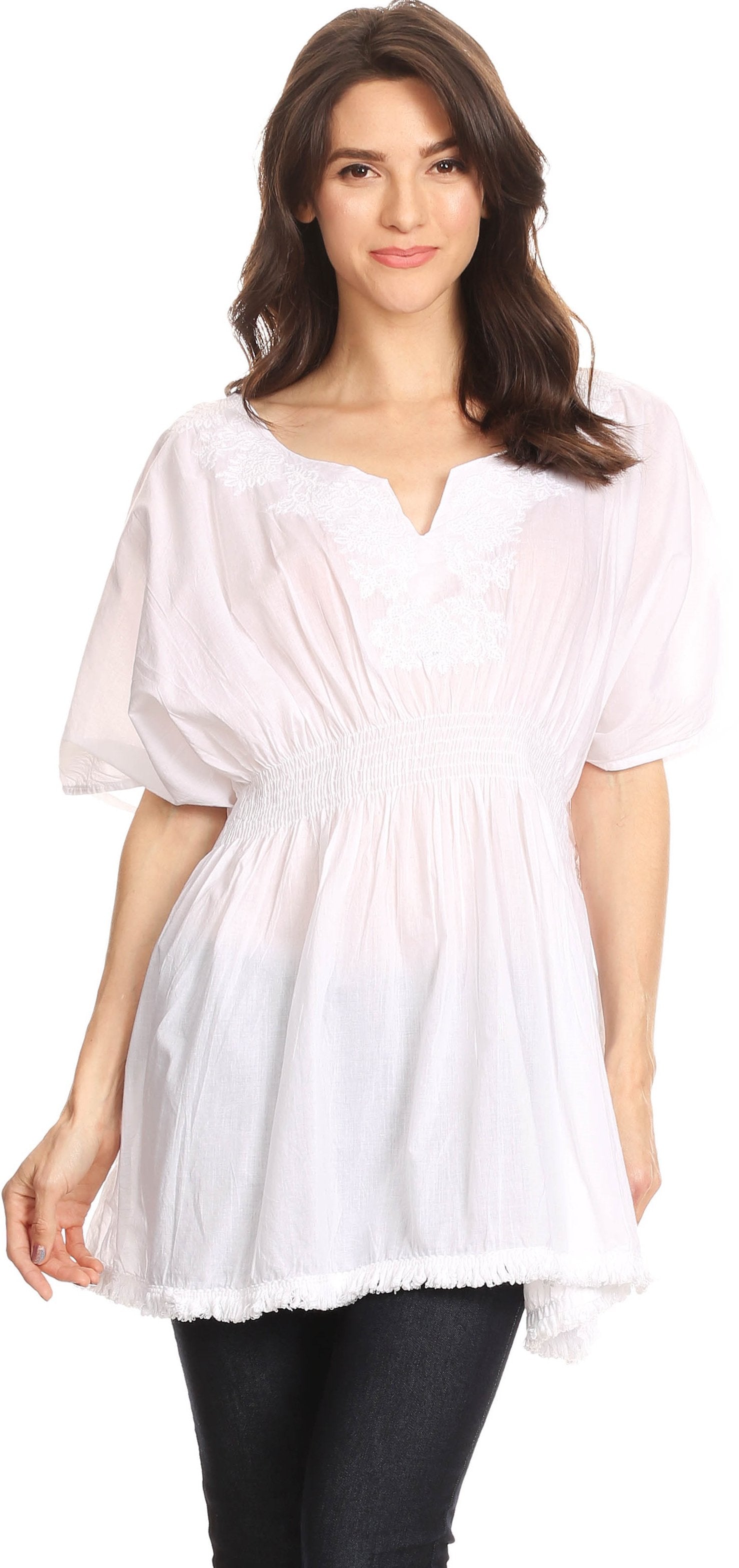 Woman wearing a white blouse with a plain background