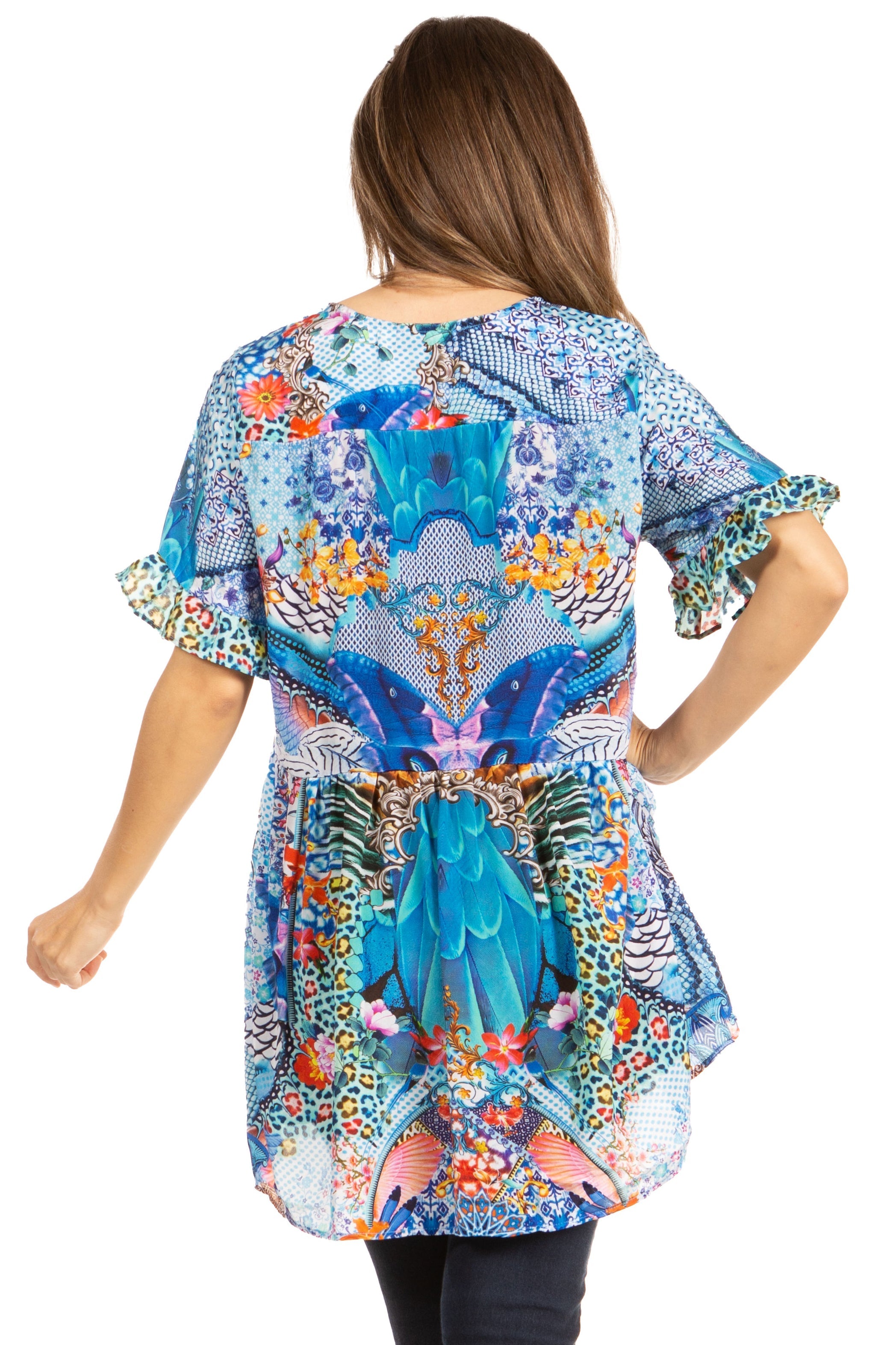 Woman wearing a colorful patterned dress on a white background